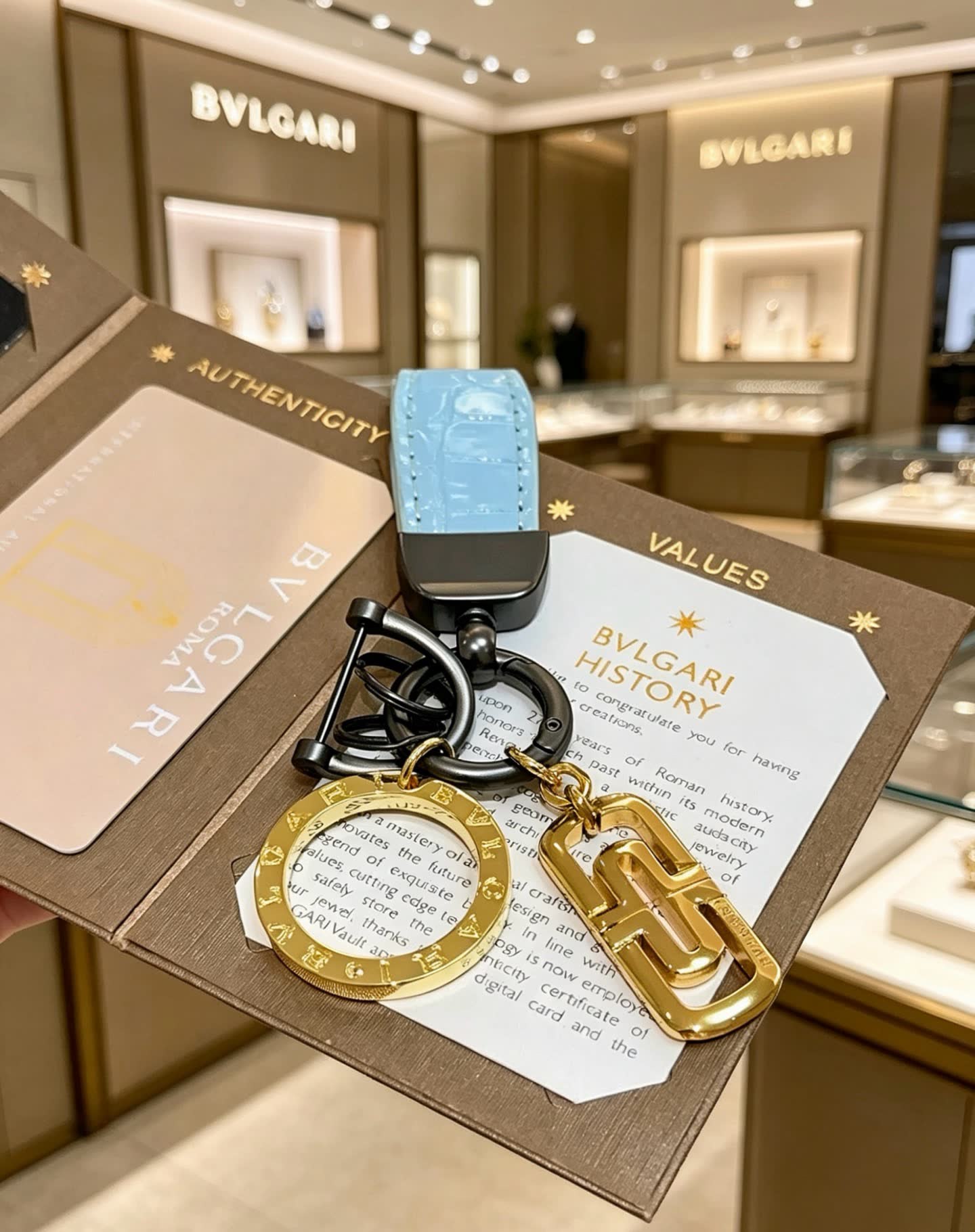 Bvlgari Blue Leather Keychain with Gold Charms