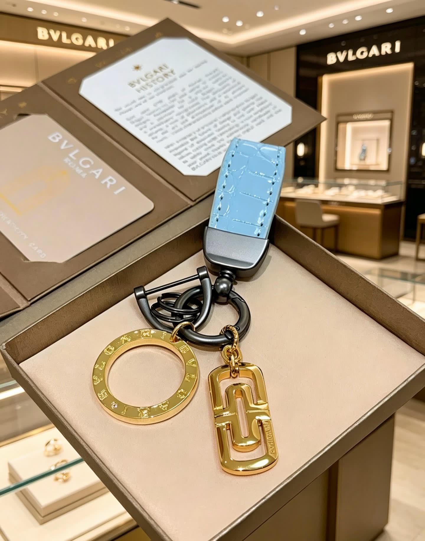 Bvlgari Blue Leather Keychain with Gold Charms