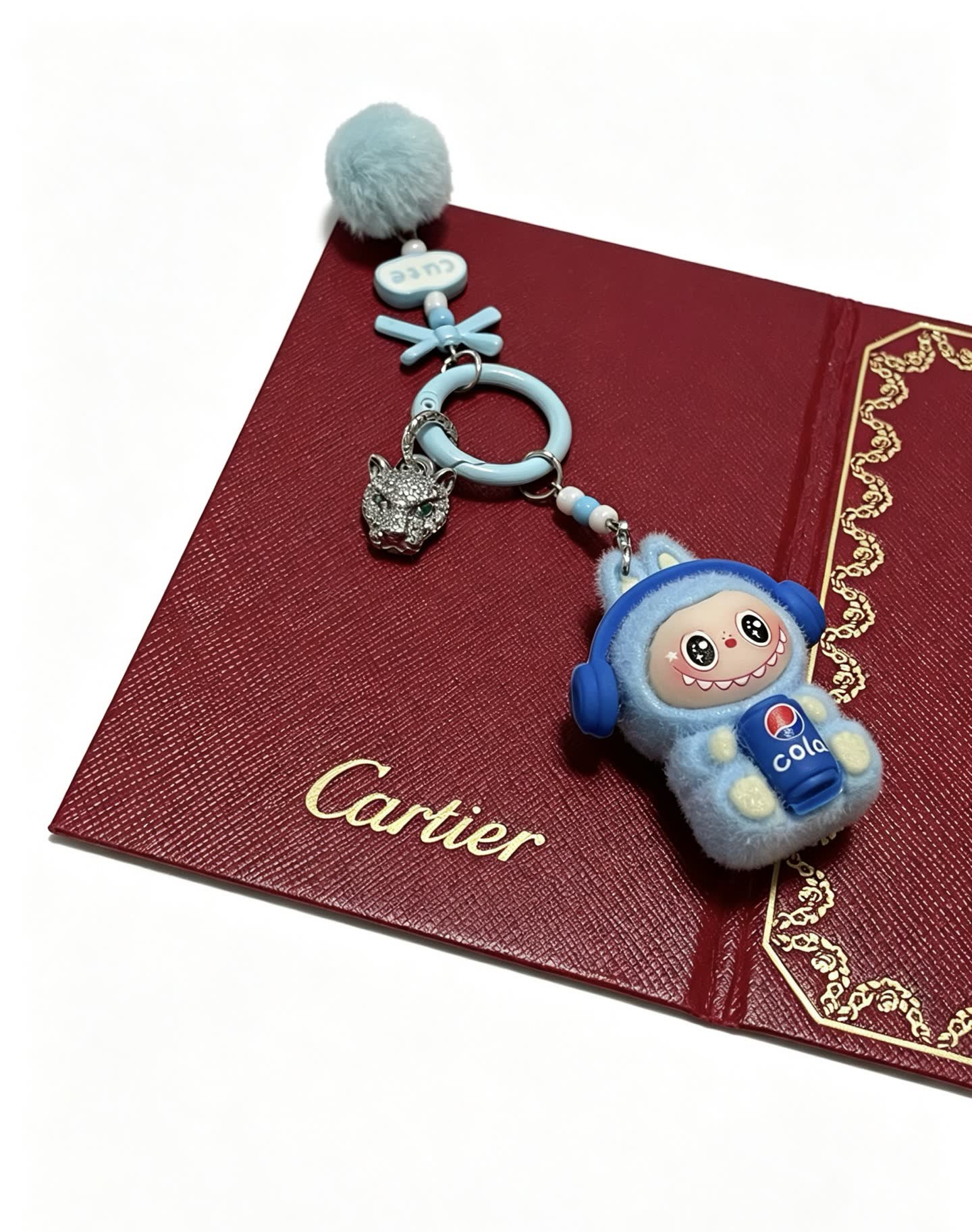 Cartier Keychain with Blue Fur and Diamond Panther Charm