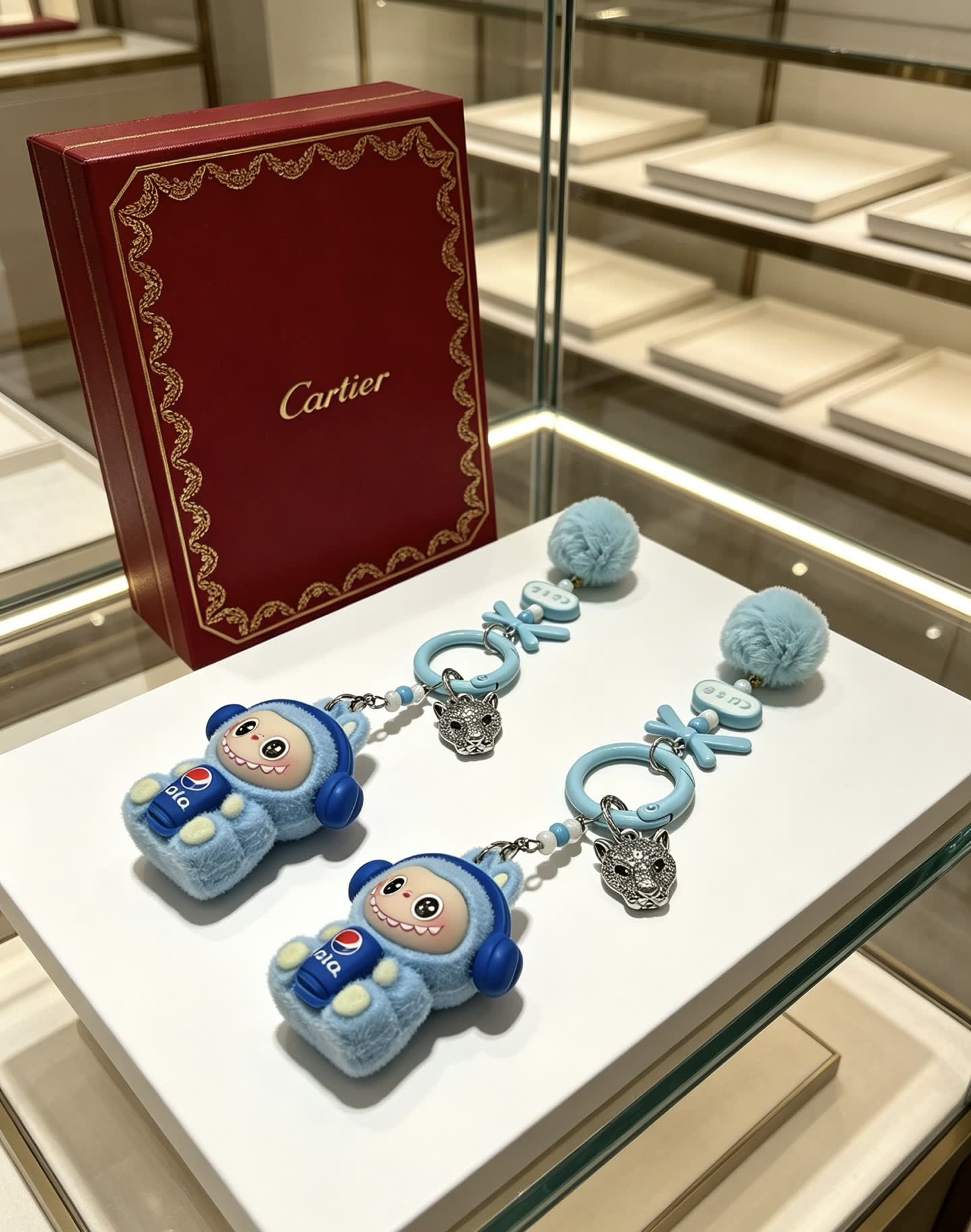 Cartier Keychain with Blue Fur and Diamond Panther Charm