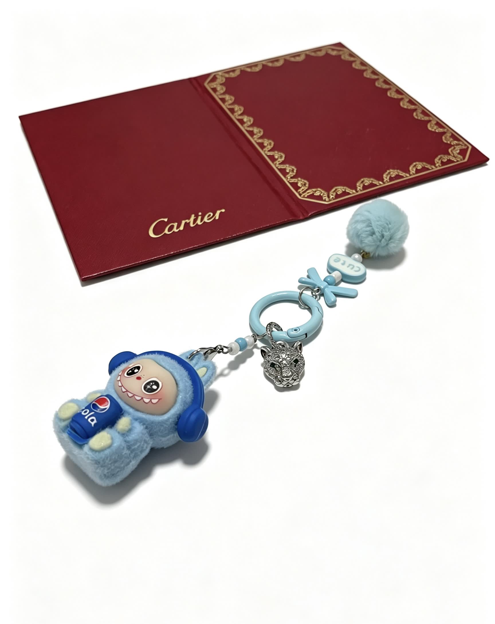 Cartier Keychain with Blue Fur and Diamond Panther Charm