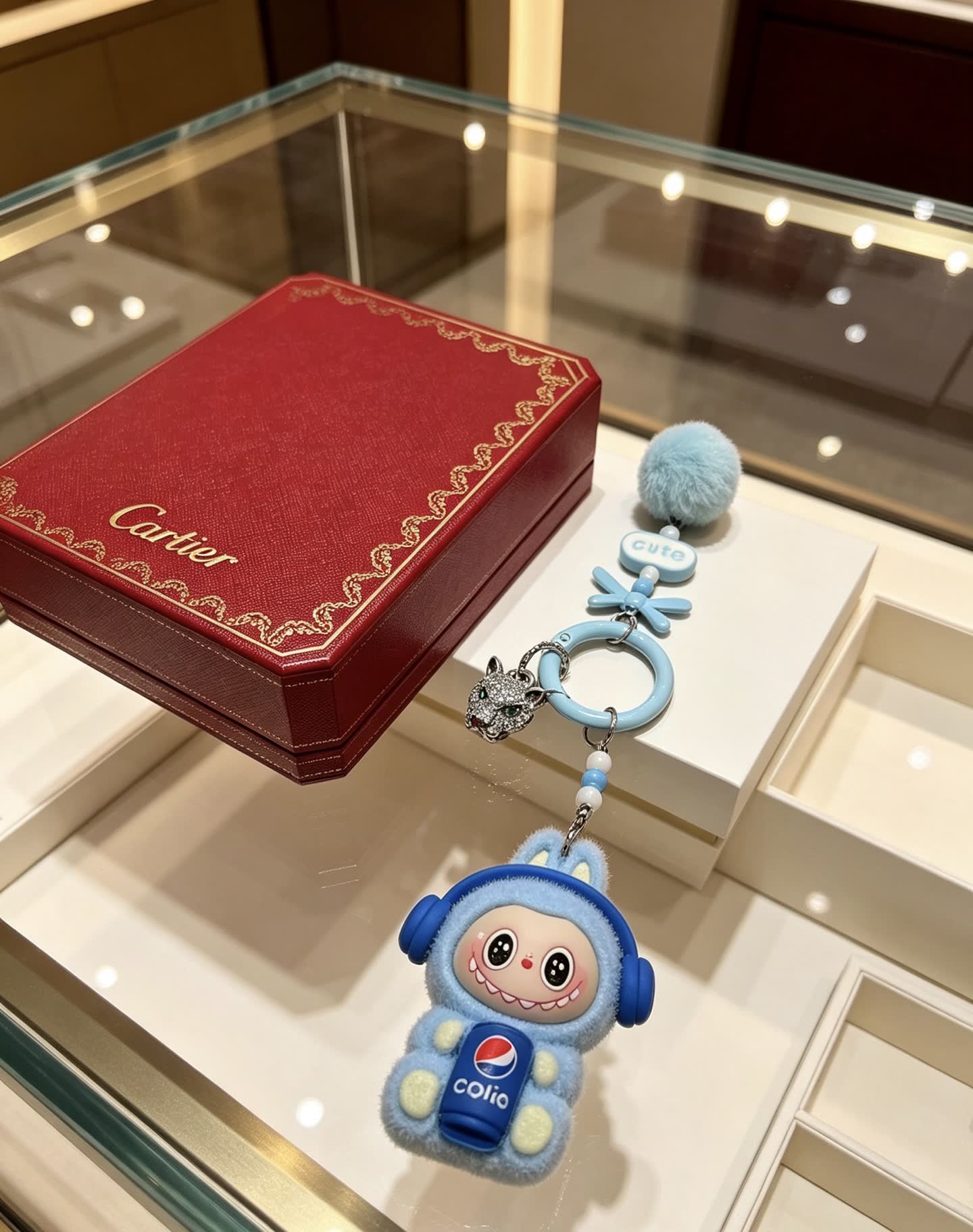 Cartier Keychain with Blue Fur and Diamond Panther Charm