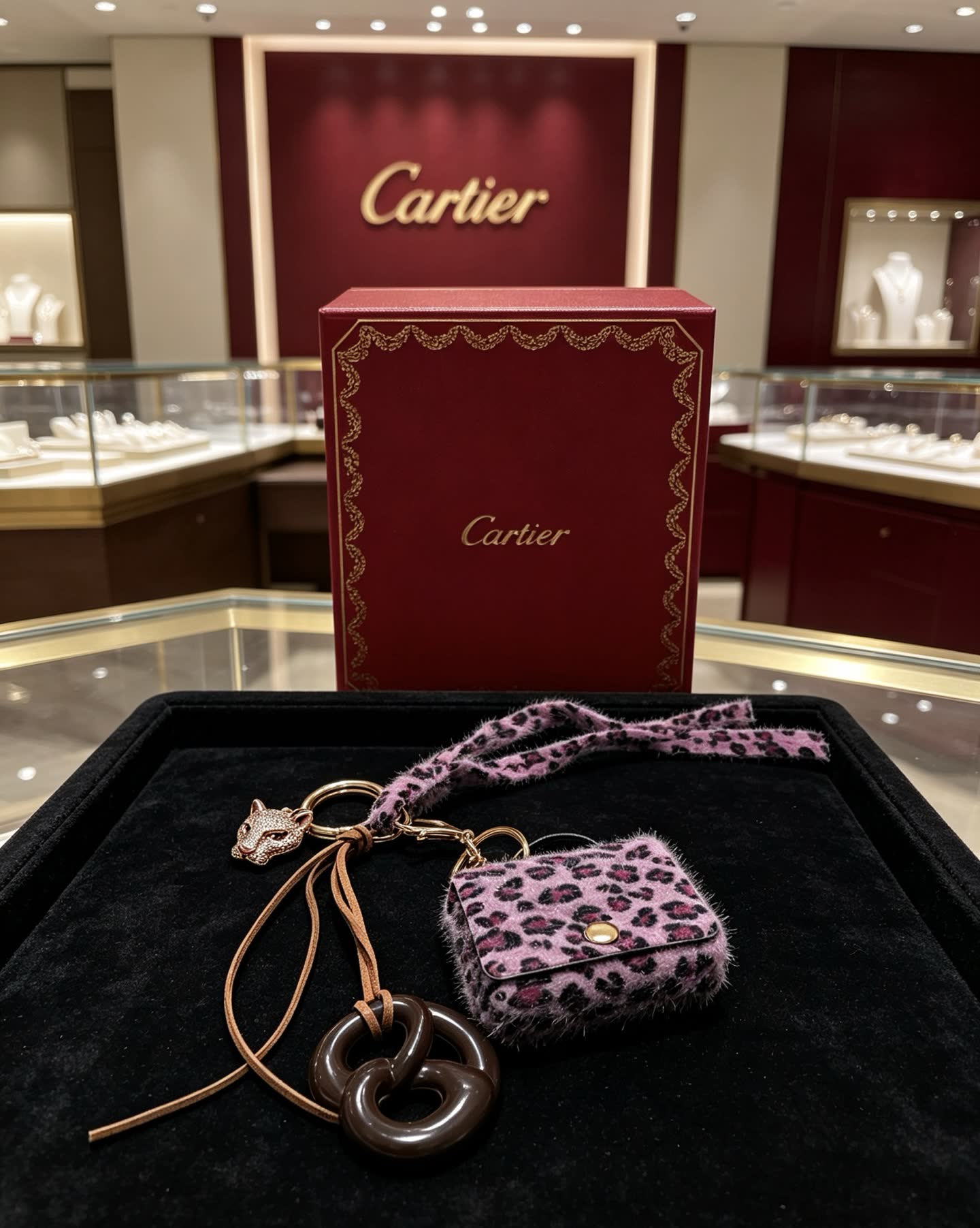 Cartier Leopard Print Keychain with Gold Panther Charm