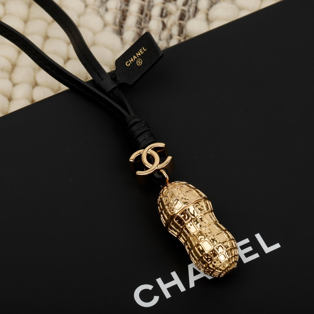 Chanel Gold Peanut Charm with Leather Strap