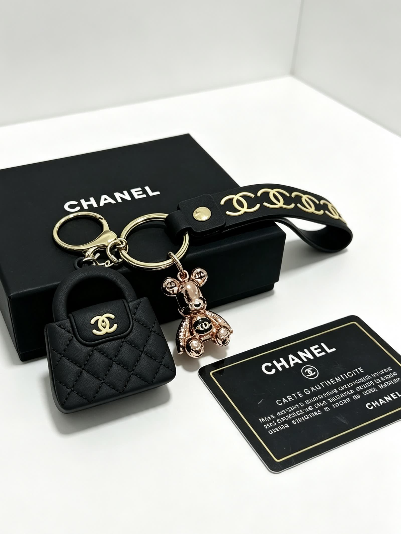 Chanel Quilted Leather Keychain with Gold Chain Strap
