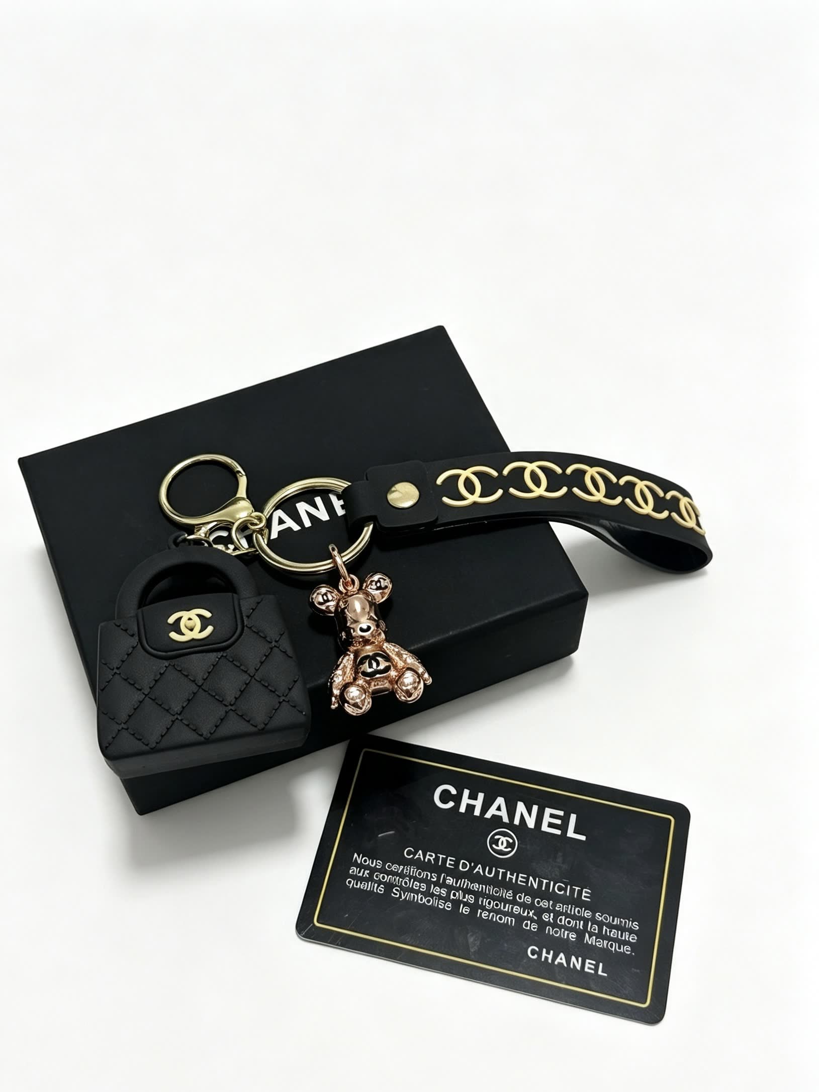 Chanel Quilted Leather Keychain with Gold Chain Strap
