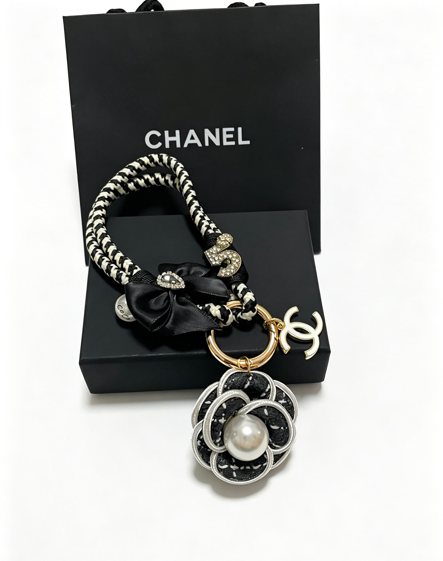 Chanel Black and White Braided Keychain with Pearl Flower Charm