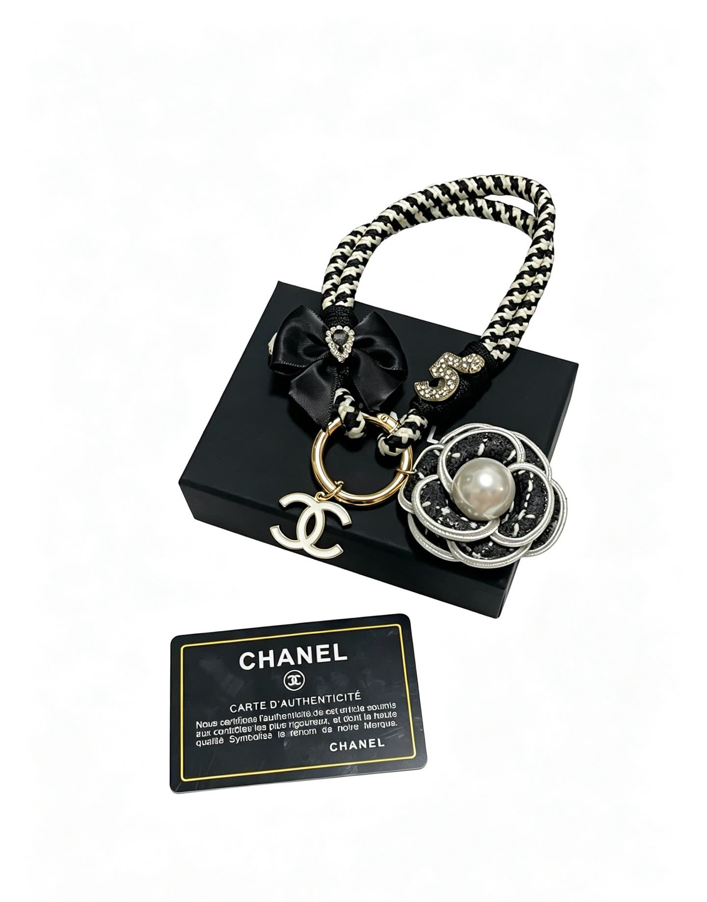 Chanel Black and White Braided Keychain with Pearl Flower Charm
