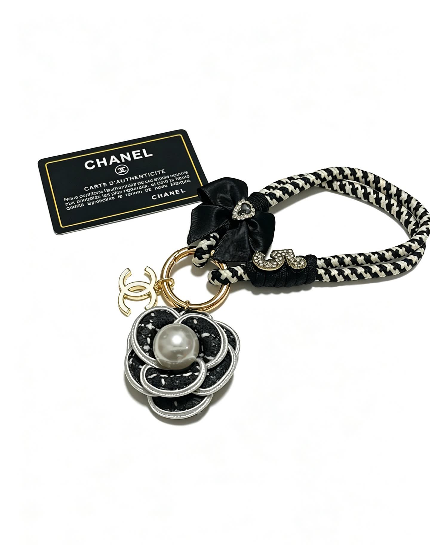 Chanel Black and White Braided Keychain with Pearl Flower Charm