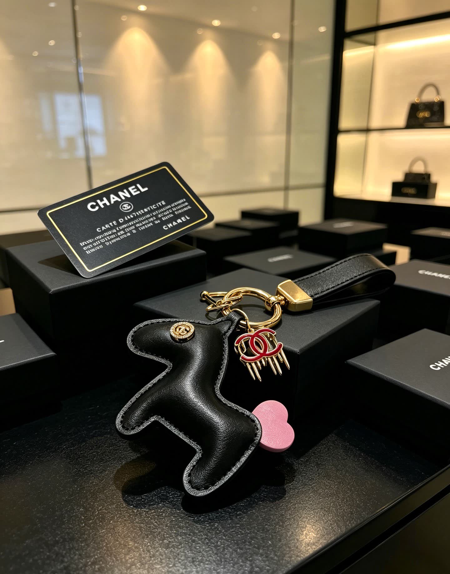 Chanel Leather Keychain with CC Logo and Pink Heart Charm