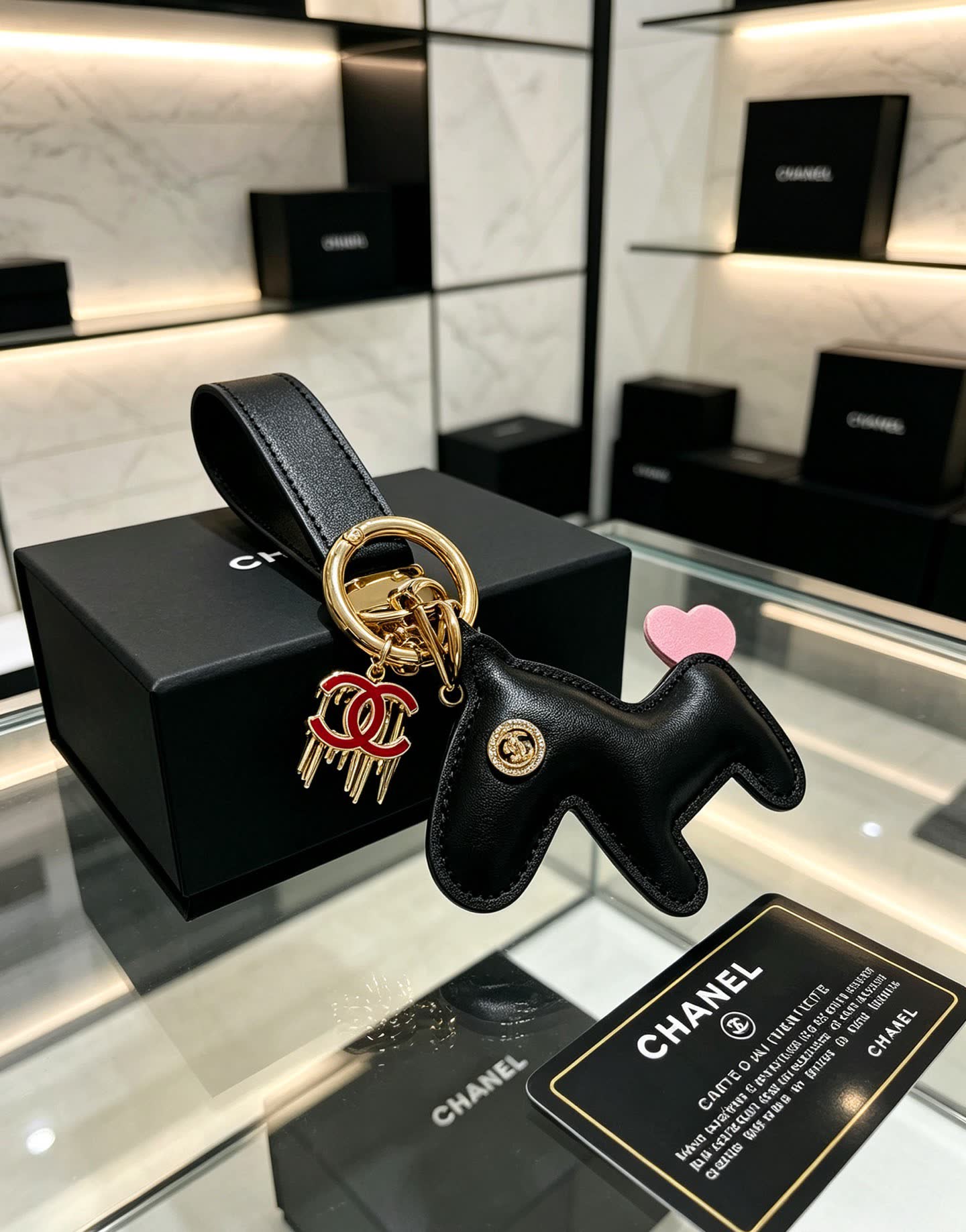 Chanel Leather Keychain with CC Logo and Pink Heart Charm