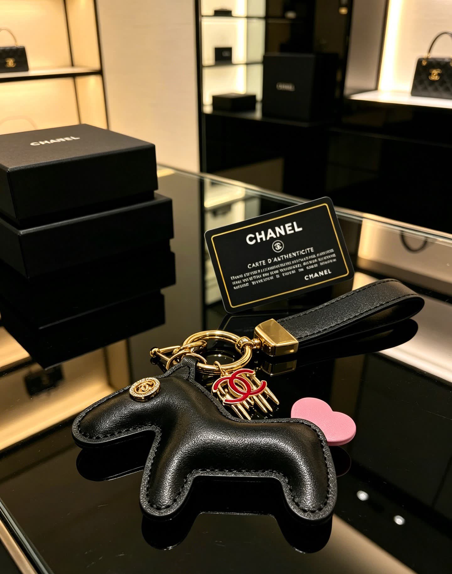 Chanel Leather Keychain with CC Logo and Pink Heart Charm