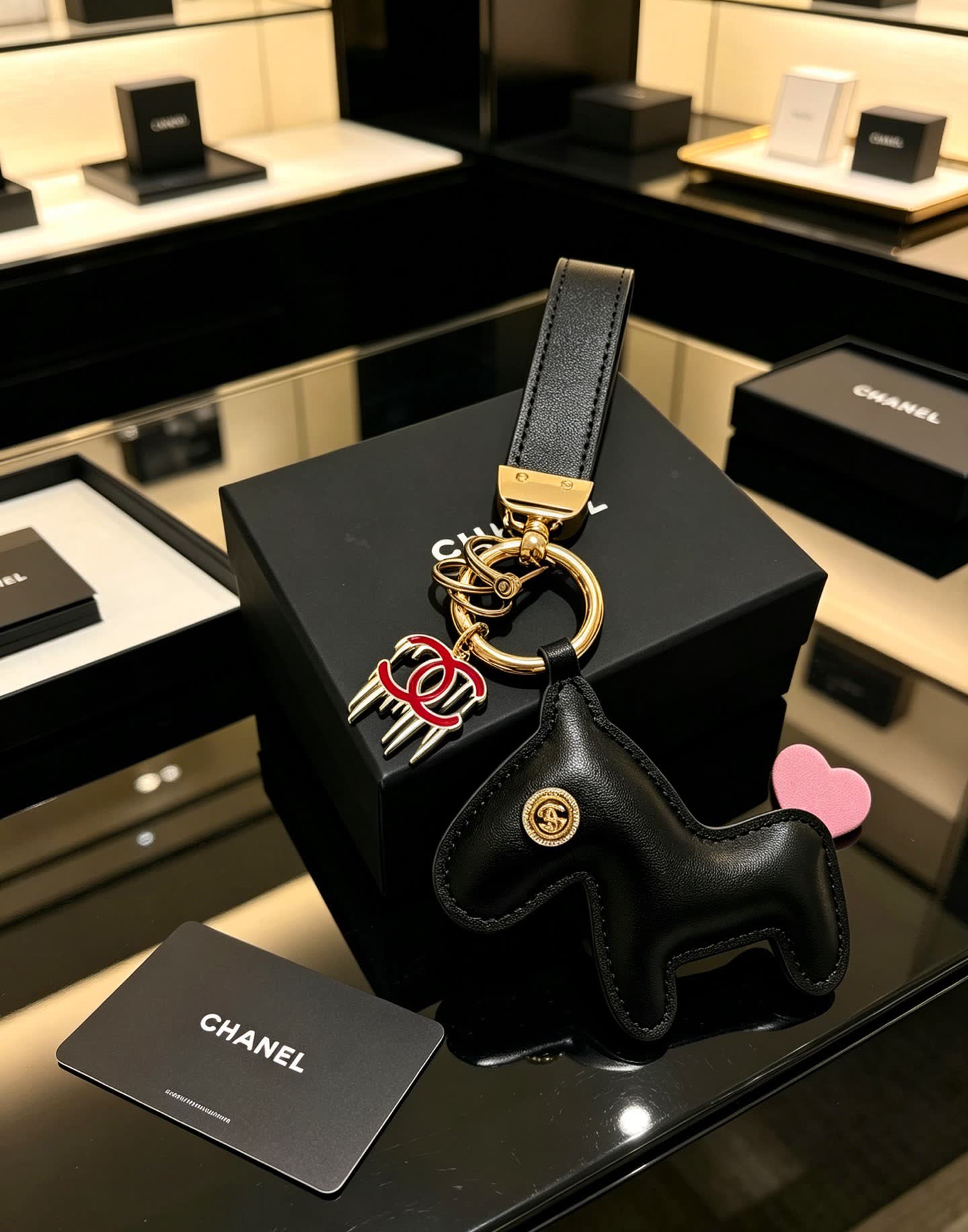 Chanel Leather Keychain with CC Logo and Pink Heart Charm