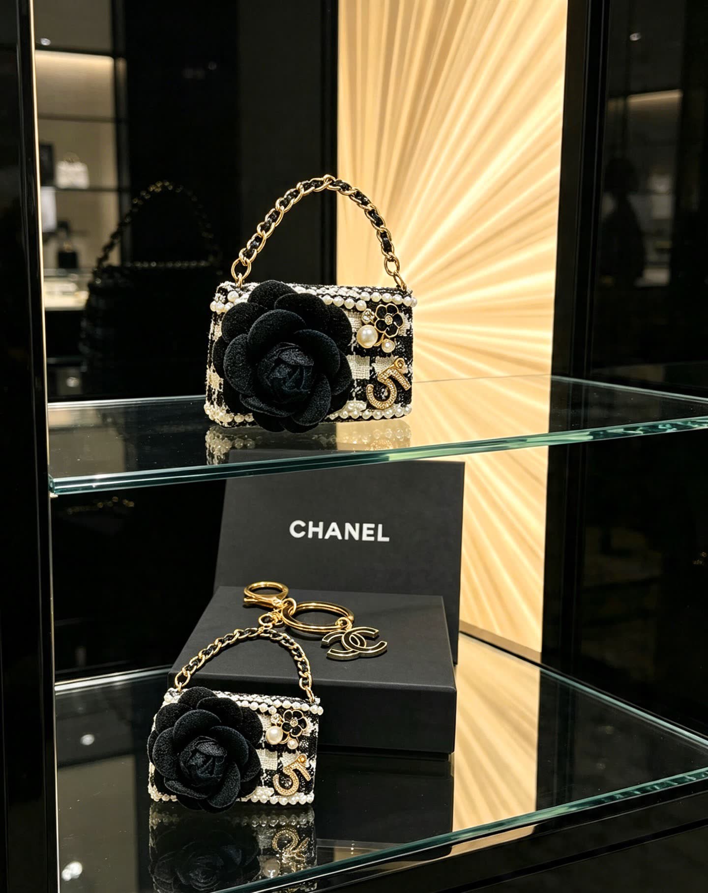 Chanel Black and White Beaded Keychain with Large Flower
