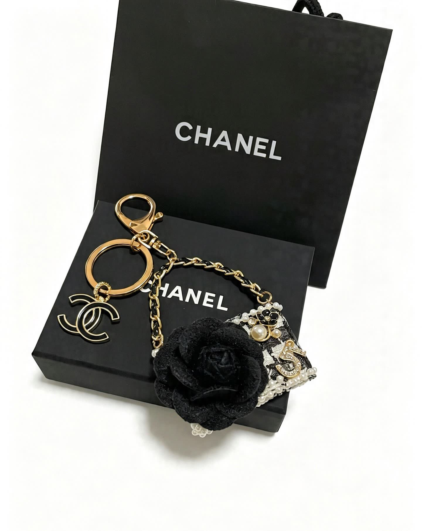 Chanel Black and White Beaded Keychain with Large Flower