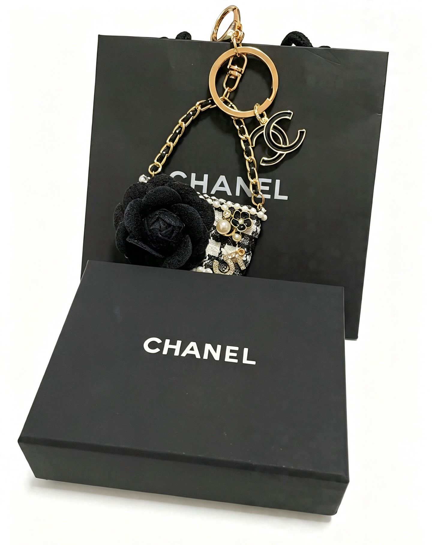 Chanel Black and White Beaded Keychain with Large Flower