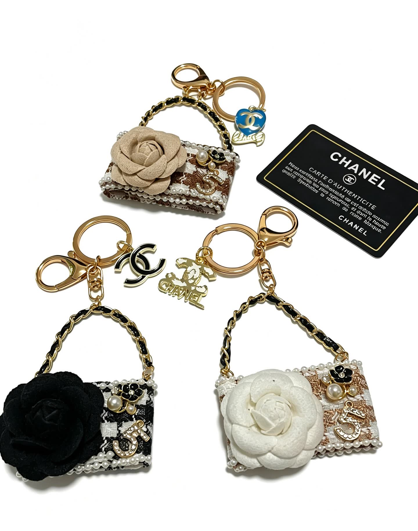 Chanel Black and White Beaded Keychain with Large Flower