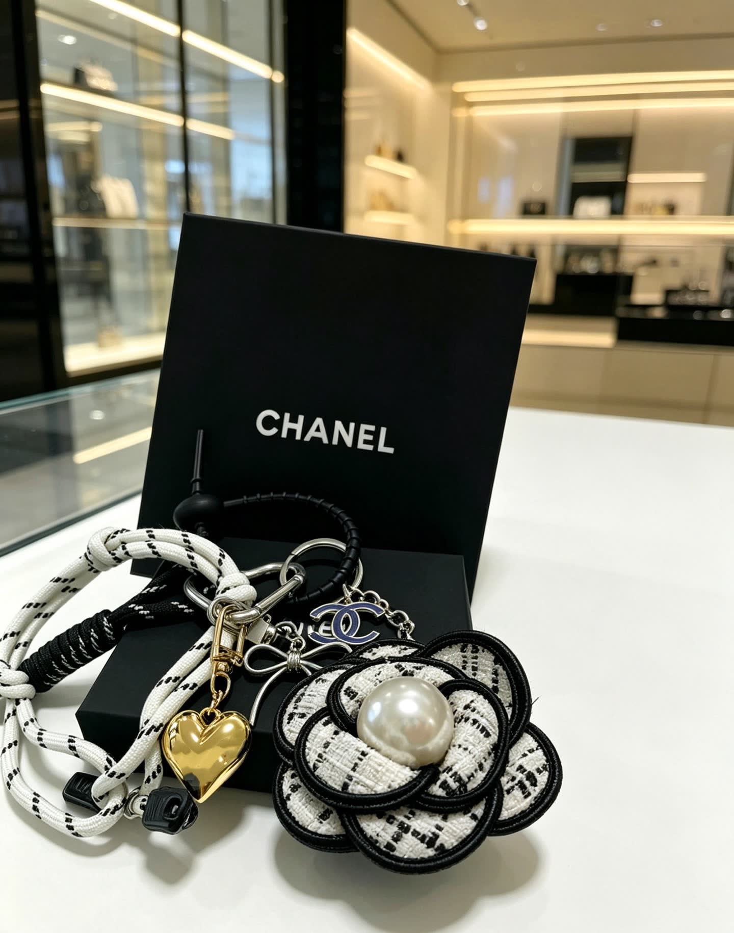 Chanel Keychain with Rope and Flower Design