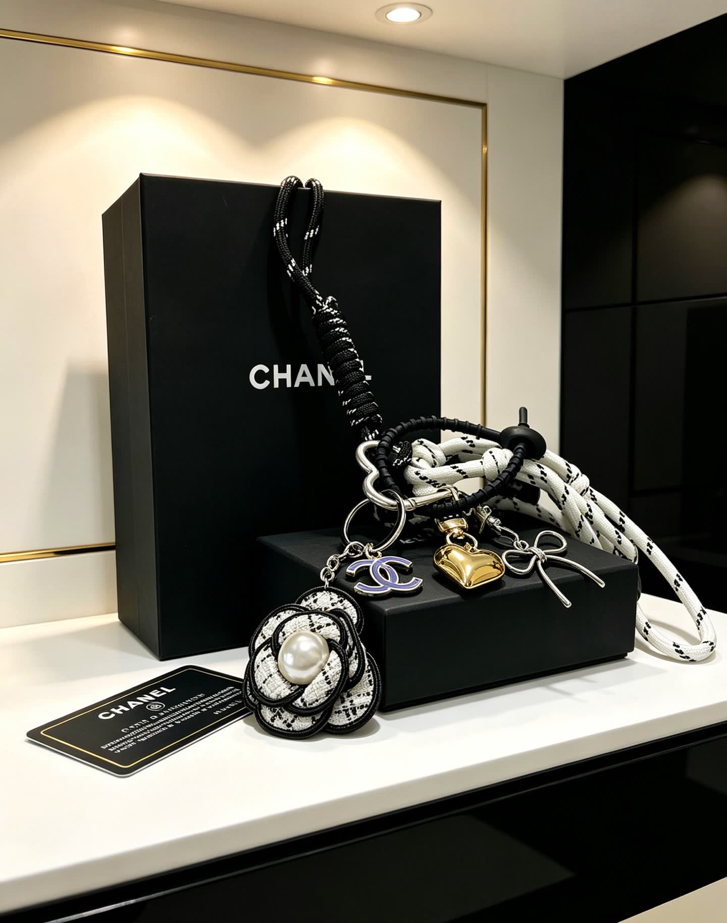 Chanel Keychain with Rope and Flower Design