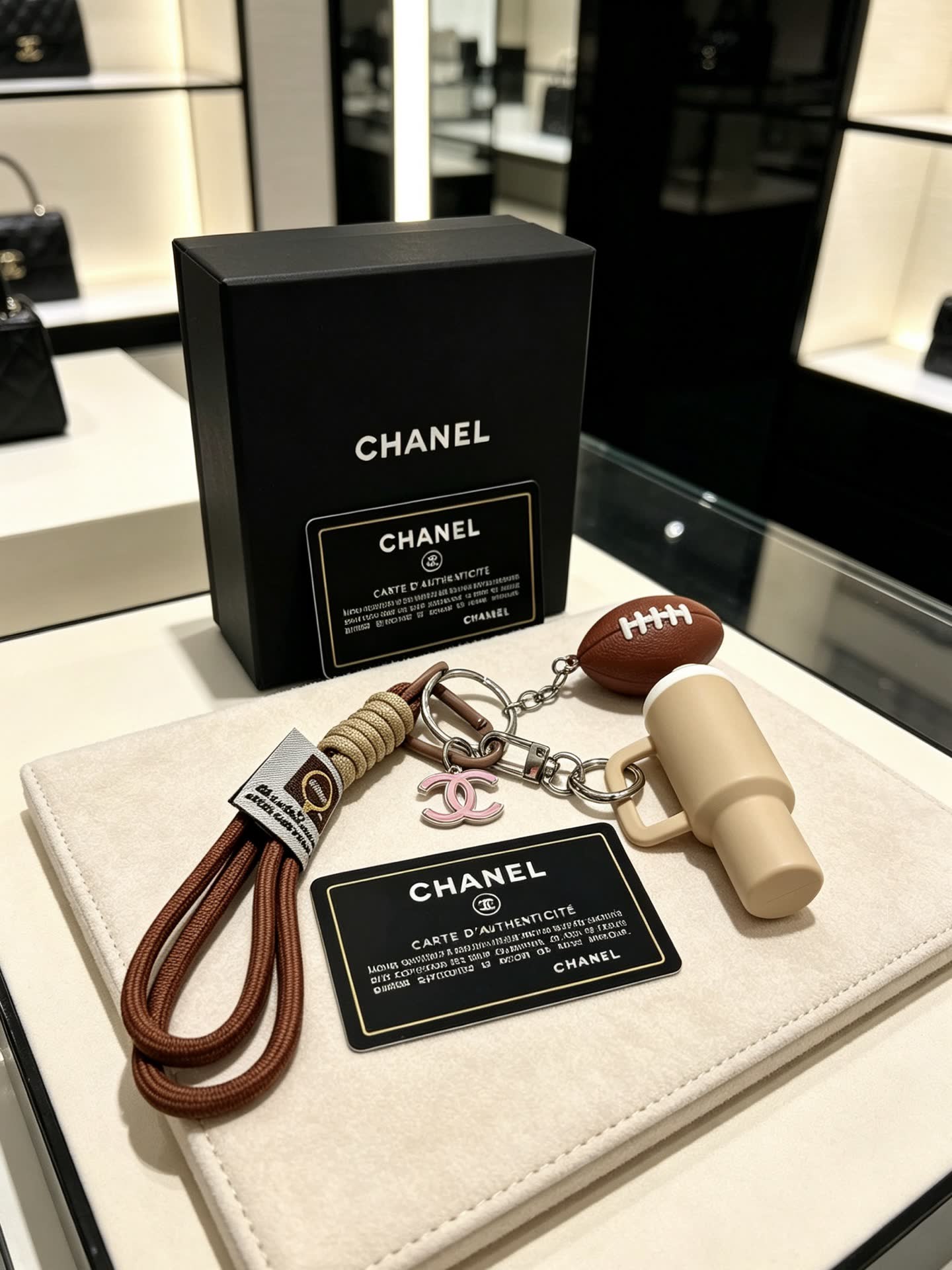 Chanel Keychain with Football and Mug Charm