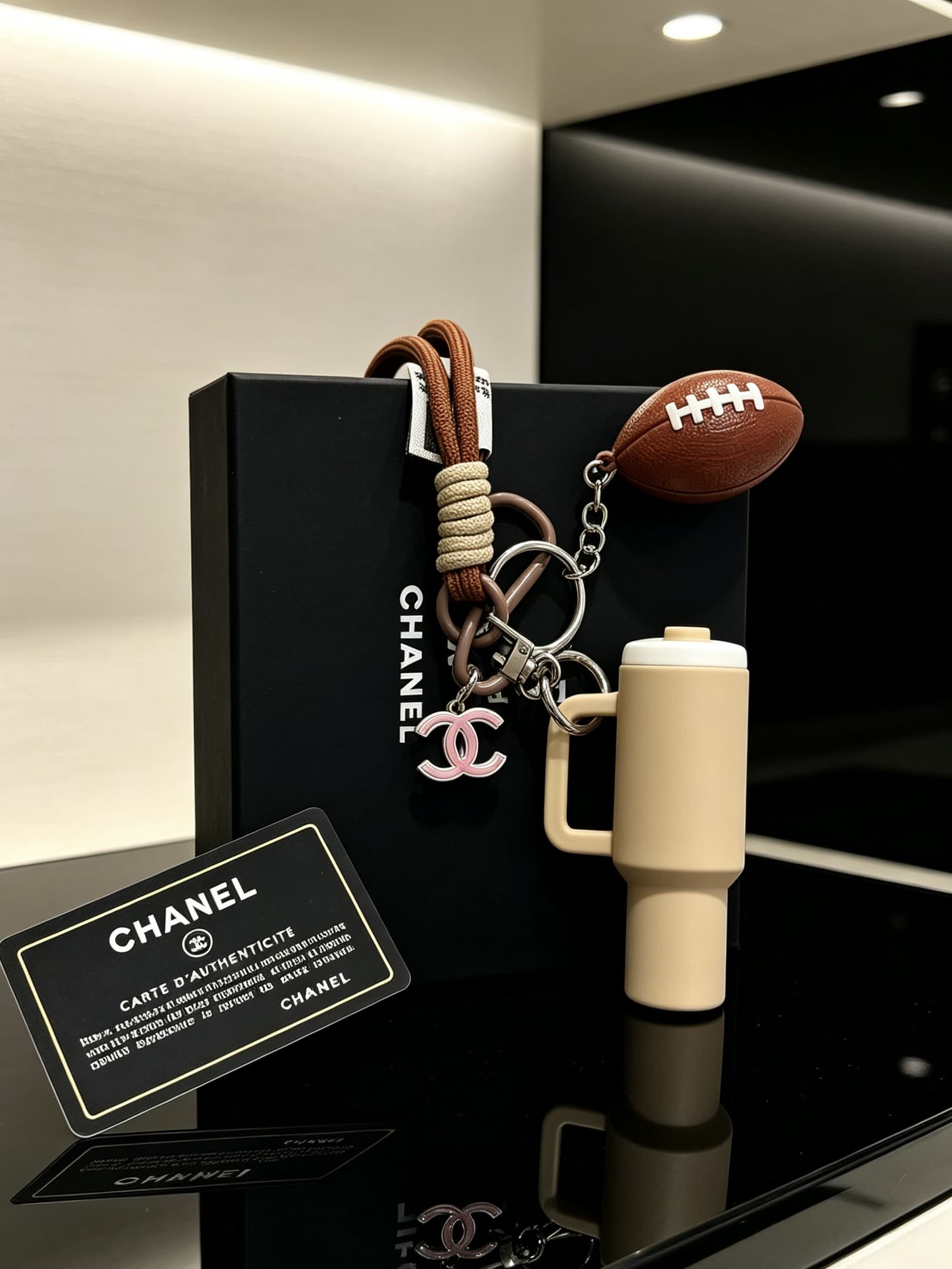 Chanel Keychain with Football and Mug Charm