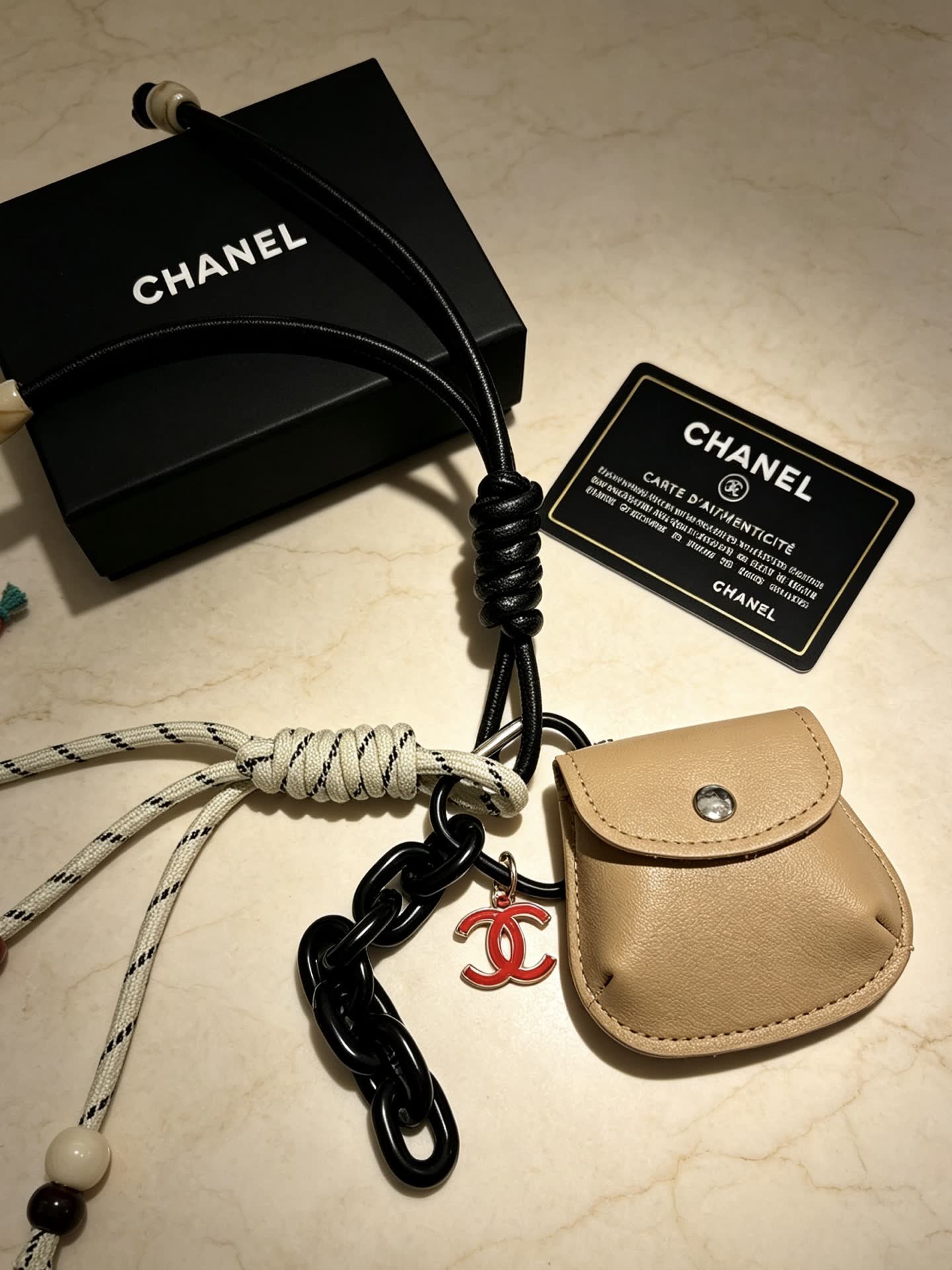 Chanel Keychain with Leather Pouch and Rope Design