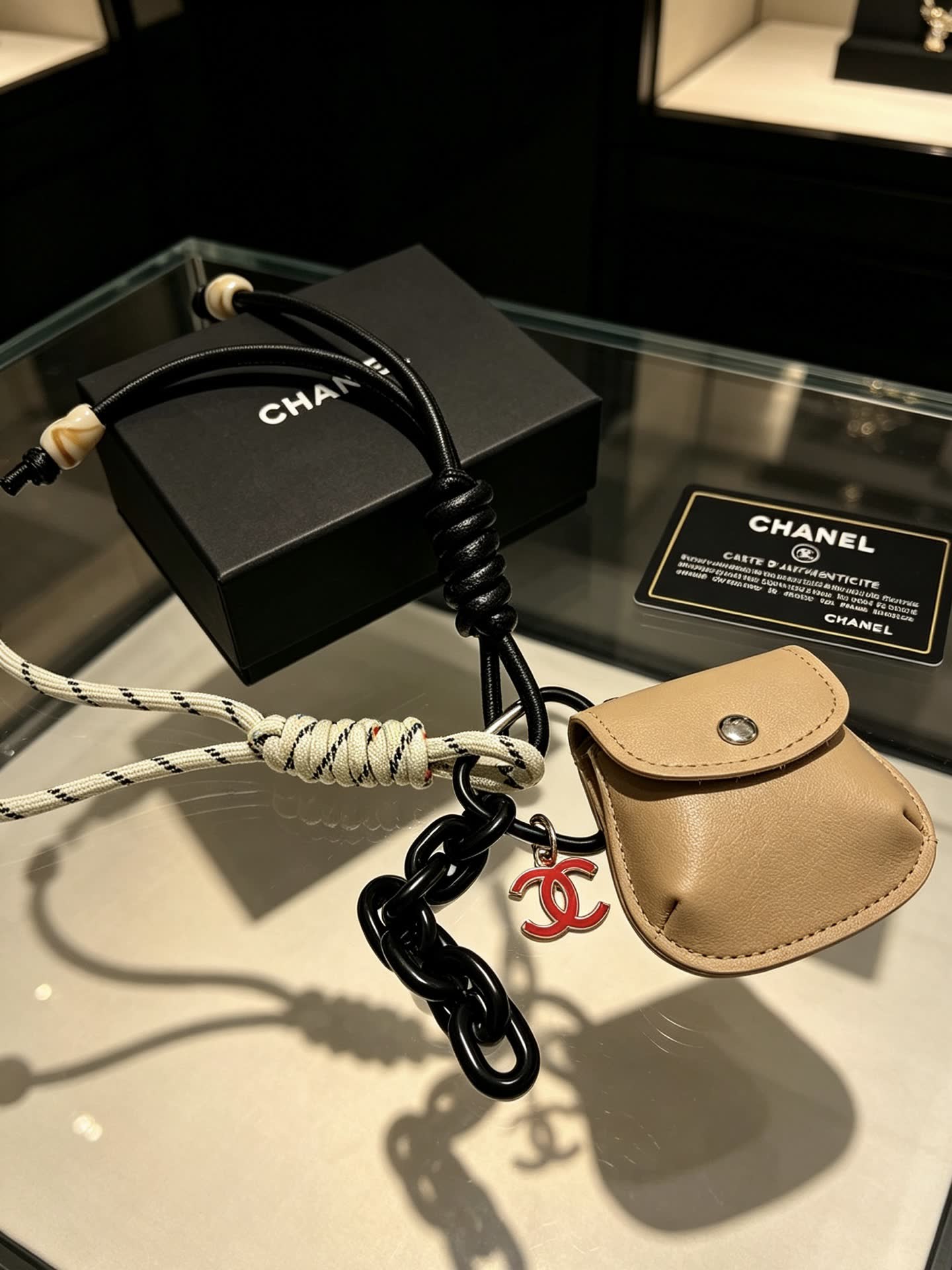 Chanel Keychain with Leather Pouch and Rope Design