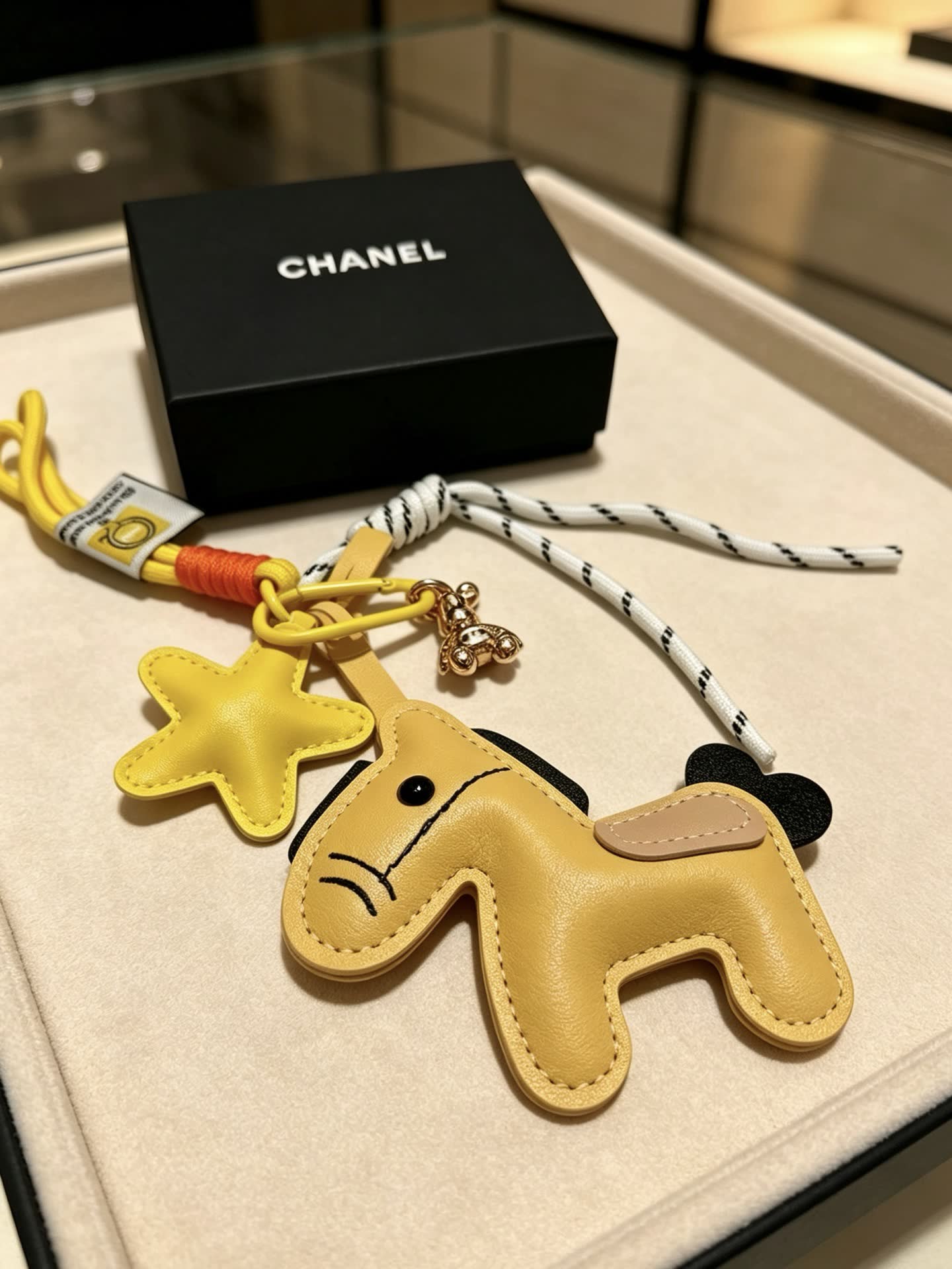 Chanel Leather Keychain with Star and Horse Charm