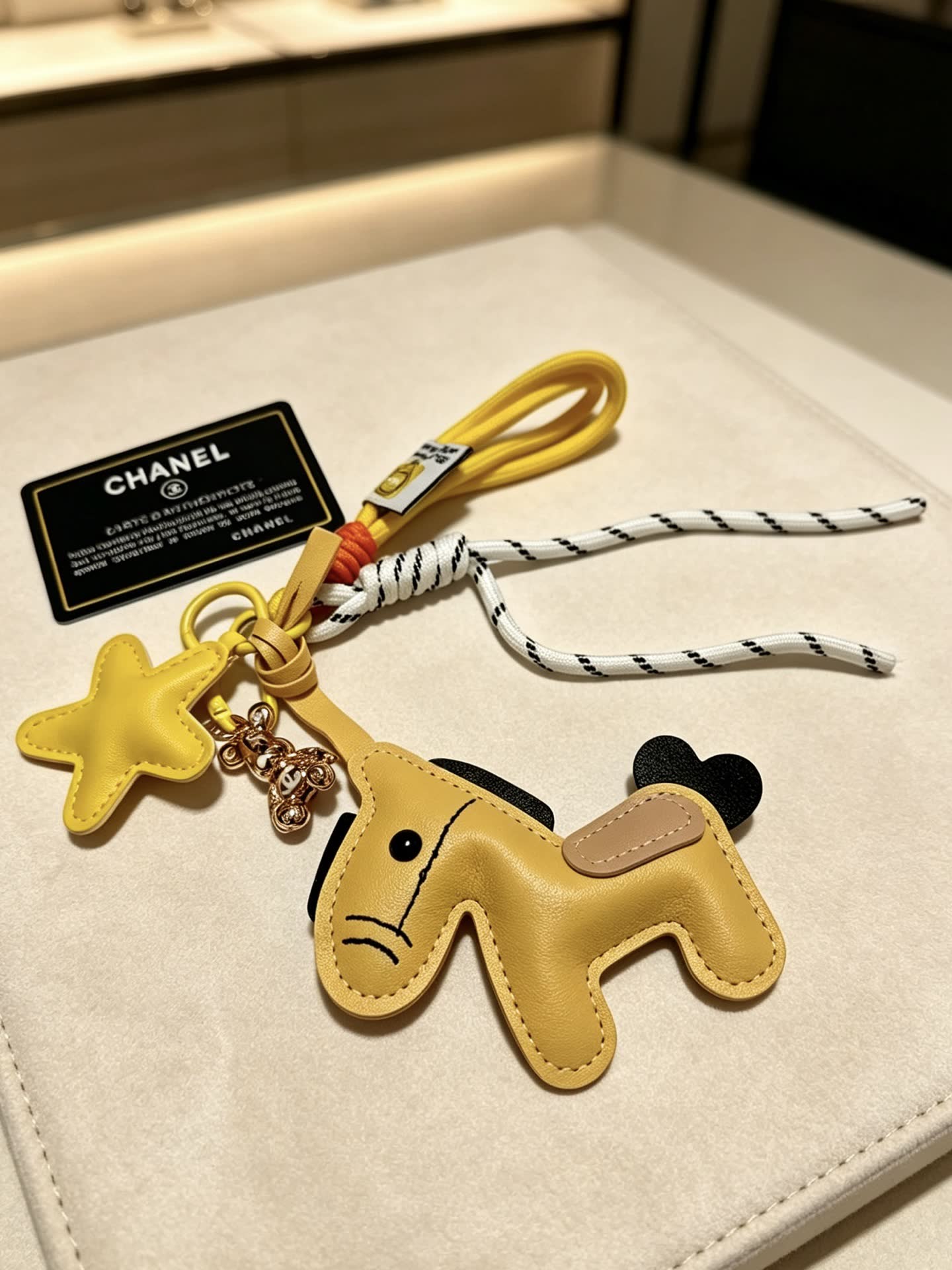 Chanel Leather Keychain with Star and Horse Charm