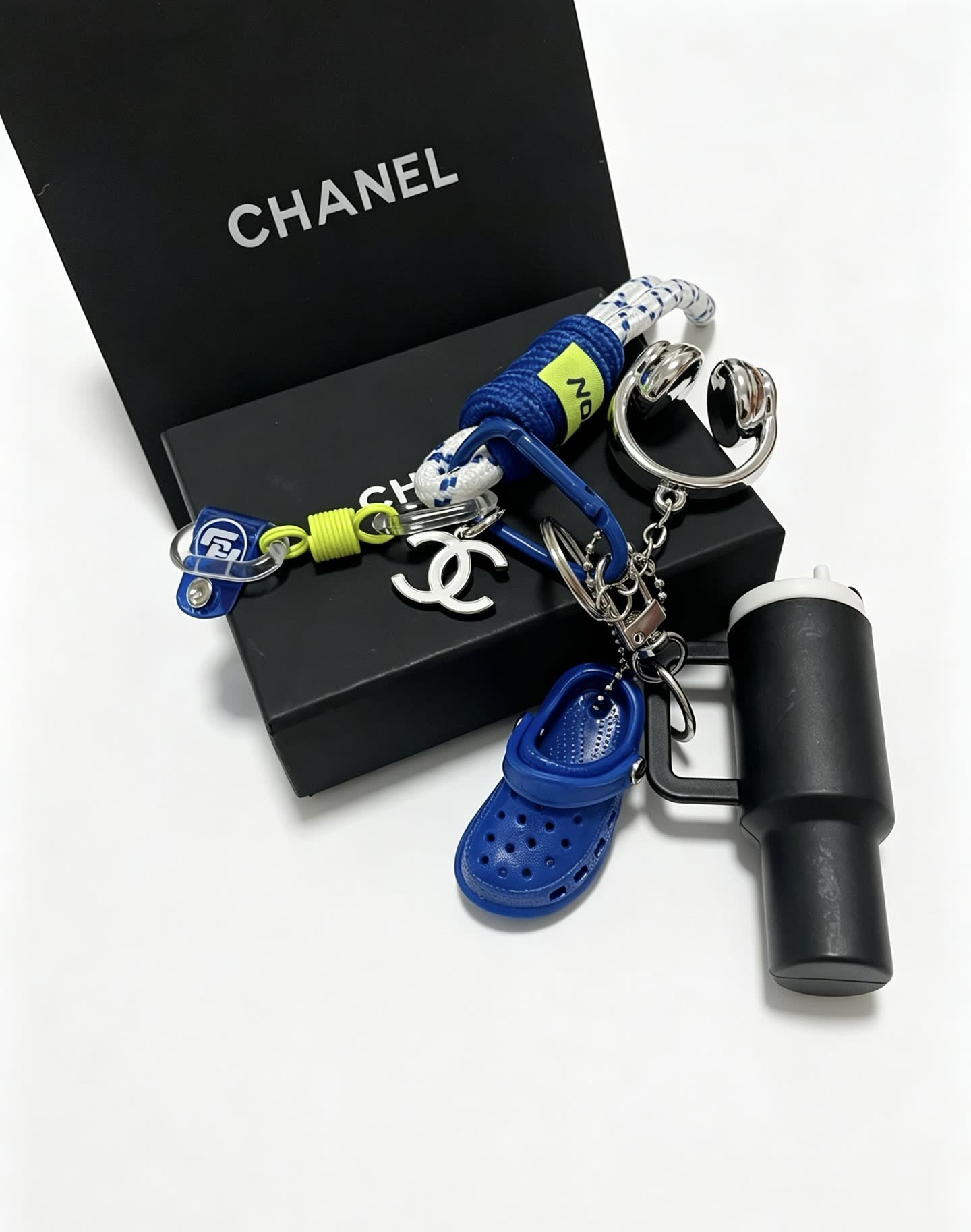 Chanel Keychain with Croc Shoe and Headphones Charm