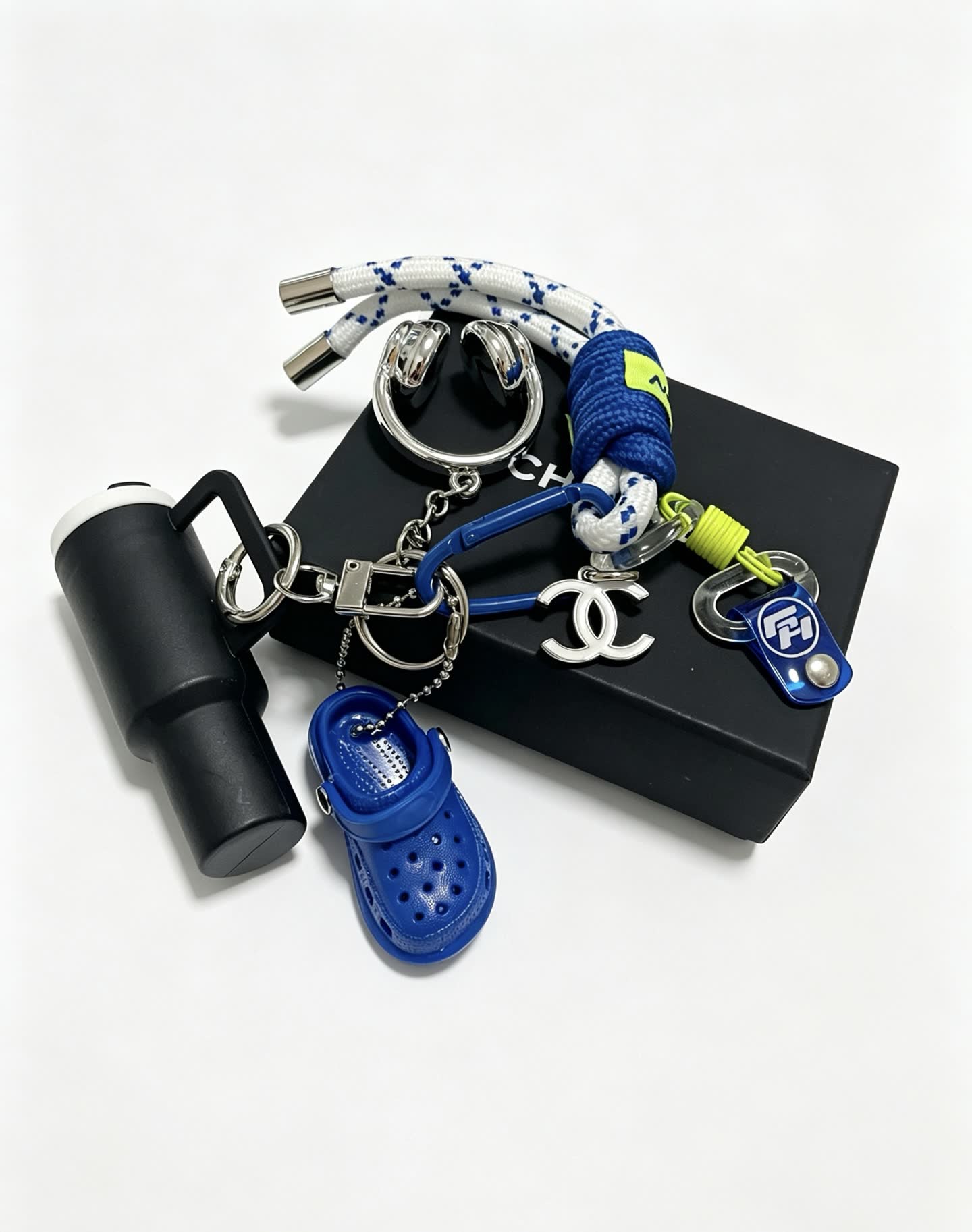 Chanel Keychain with Croc Shoe and Headphones Charm