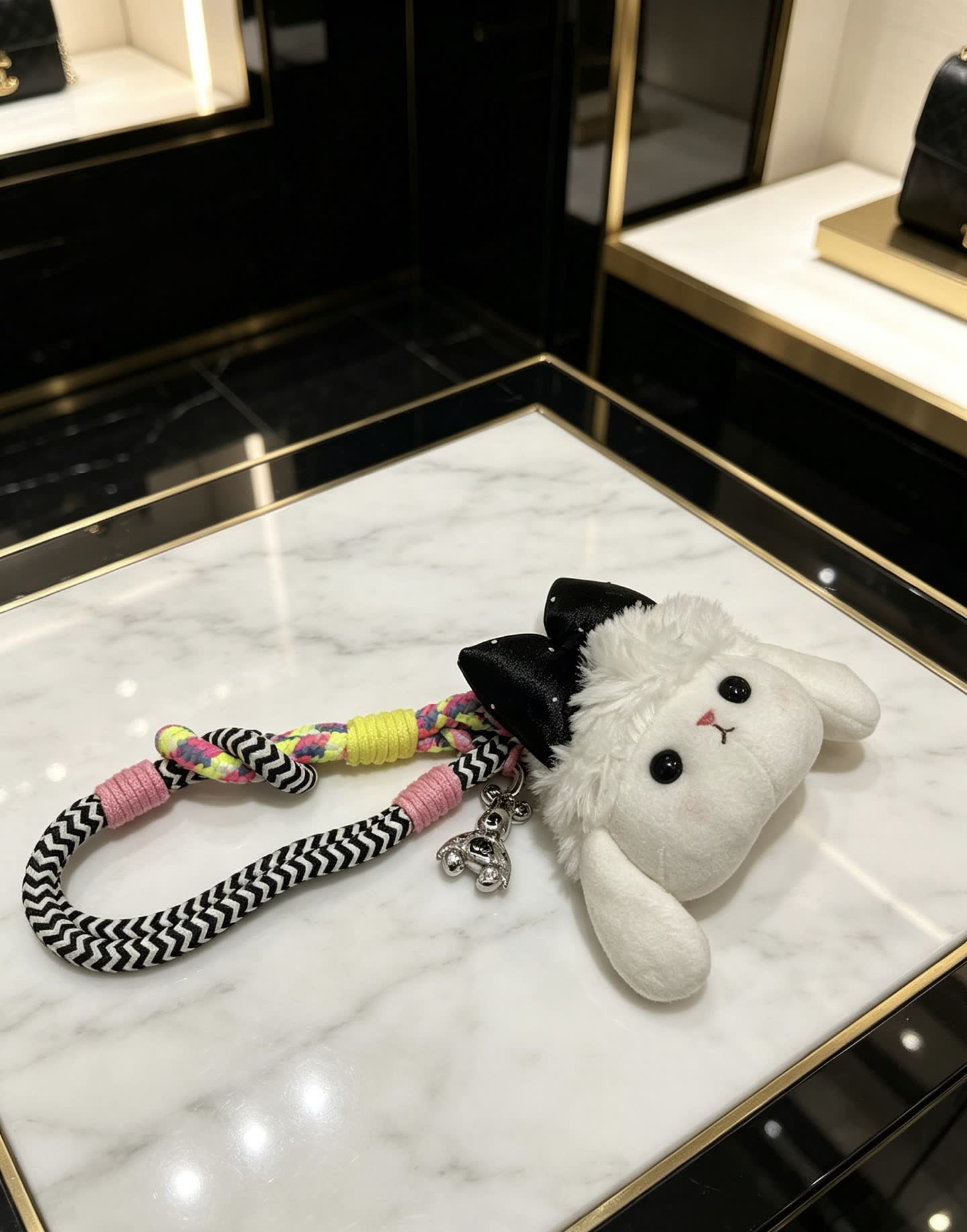 Chanel Adorable White Bunny Keychain with Black Bow and Silver Charm Chanel Adorable White Bunny Keychain with Black Bow and Silver Charm