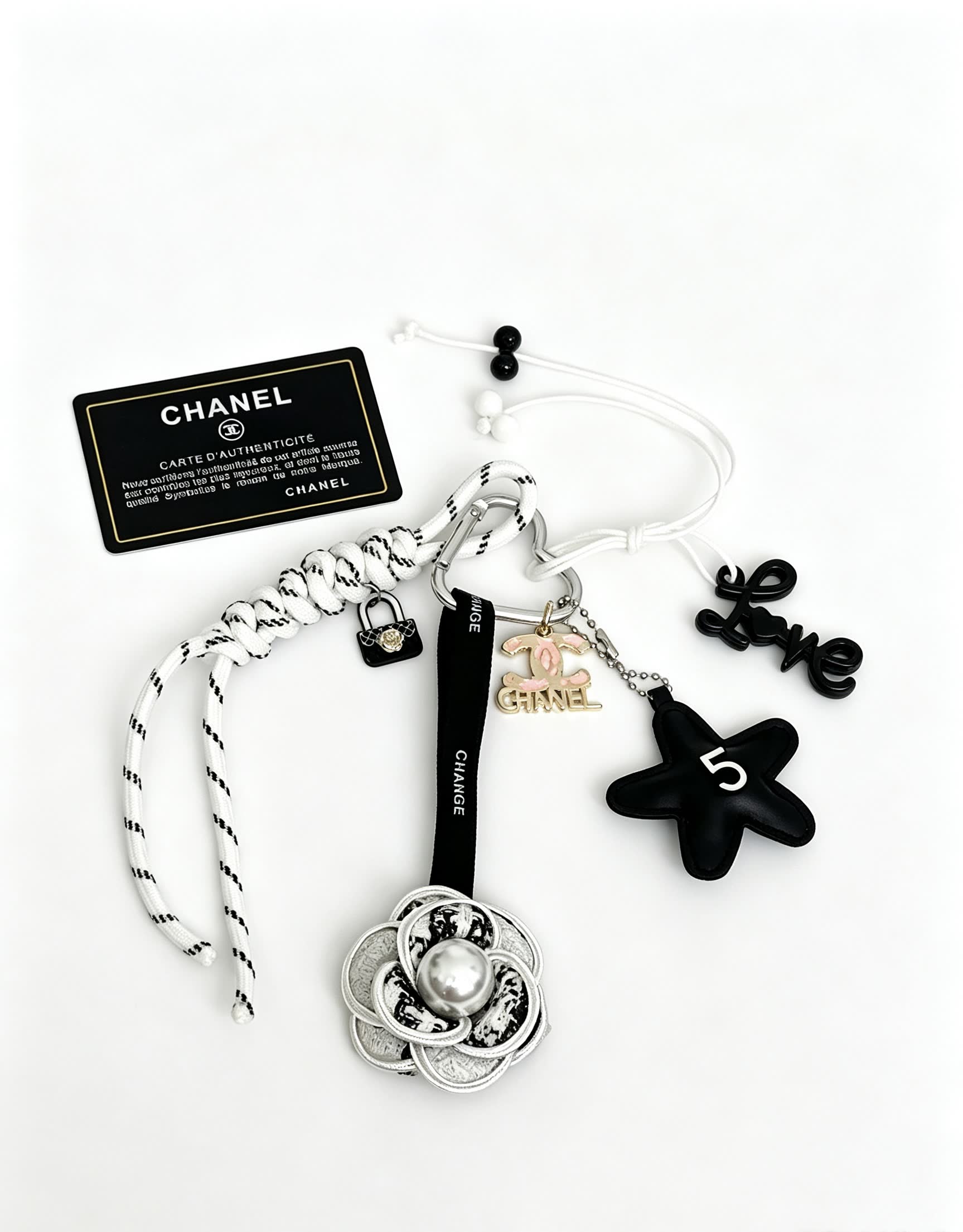 Chanel Keychain with Silver Camellia Charm