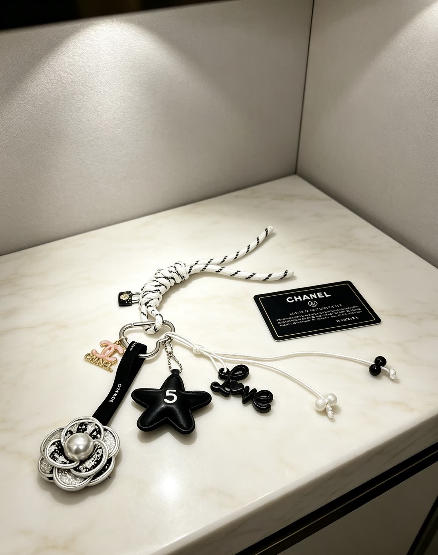 Chanel Keychain with Silver Camellia Charm