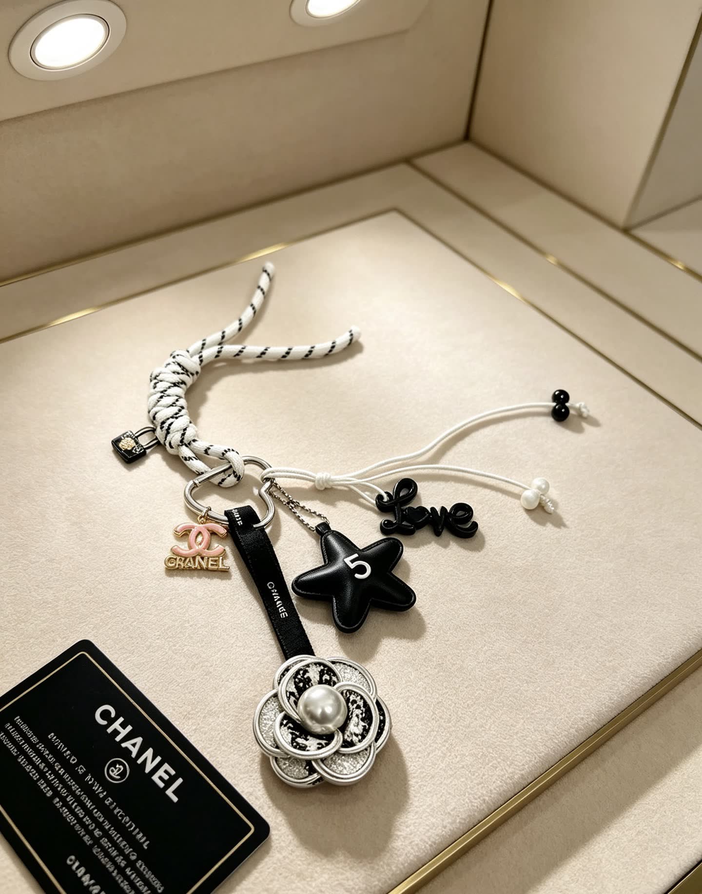 Chanel Keychain with Silver Camellia Charm