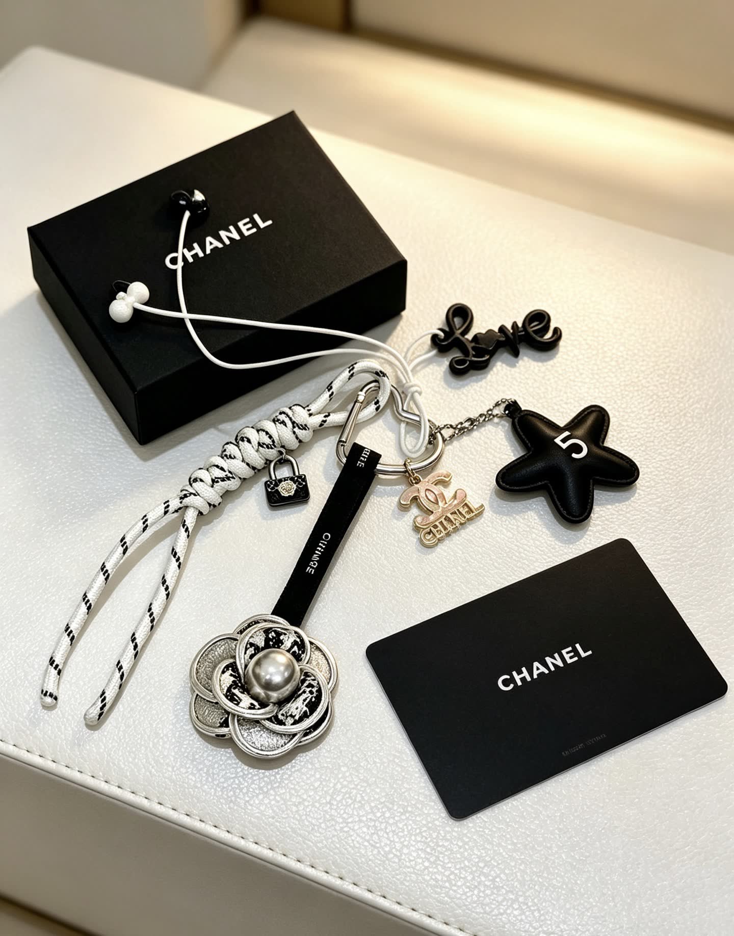 Chanel Keychain with Silver Camellia Charm