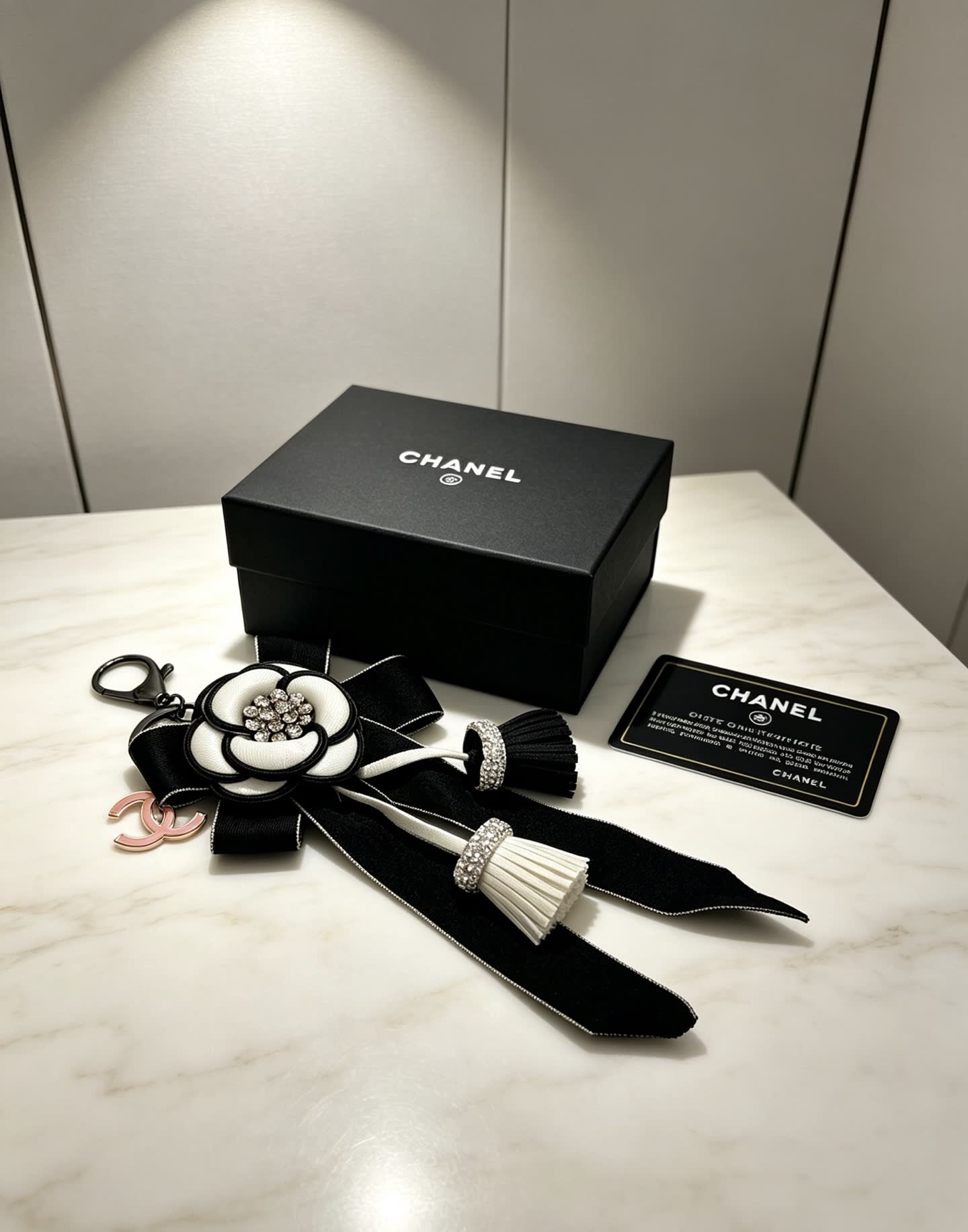 Chanel Black and White Camellia Keychain