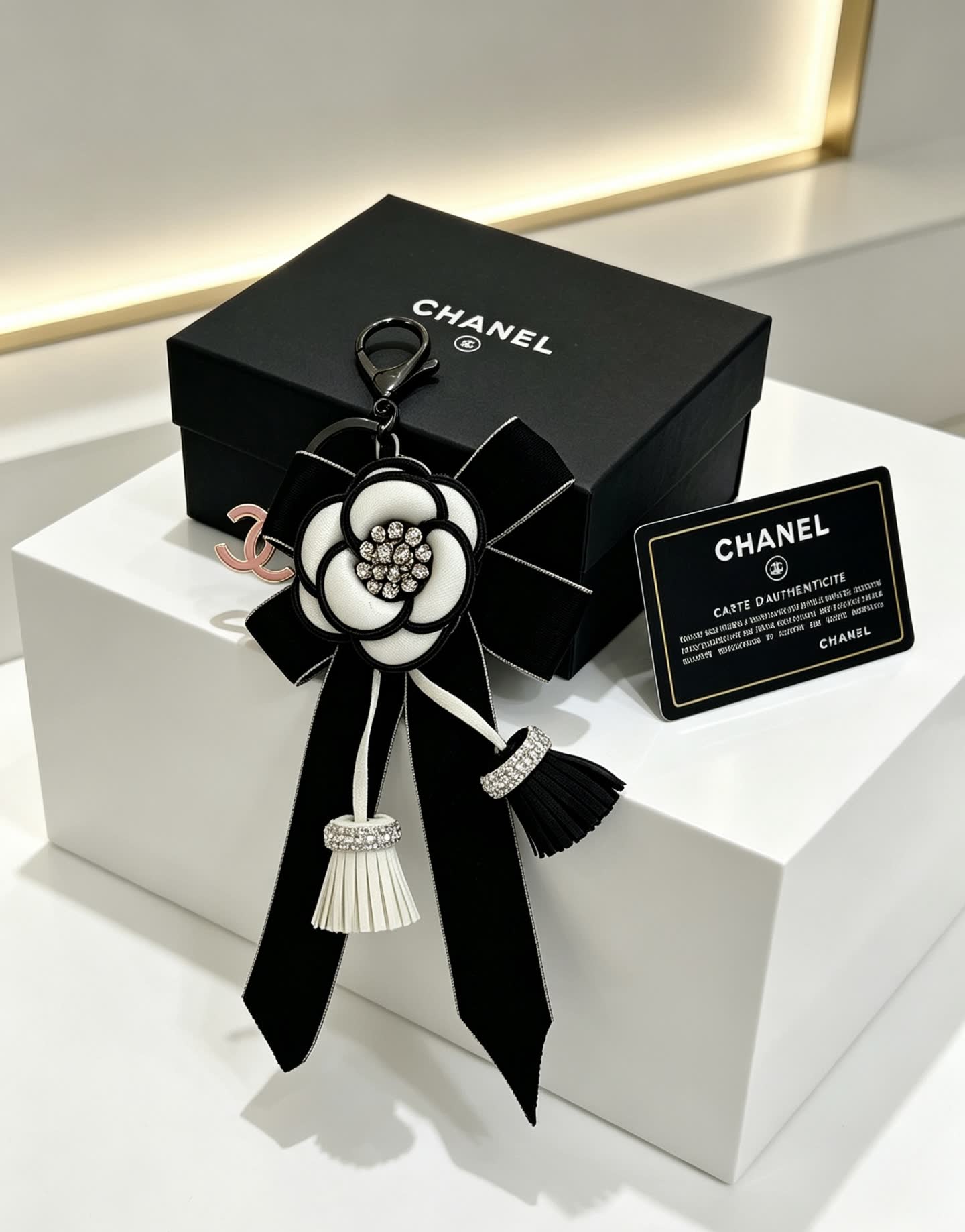 Chanel Black and White Camellia Keychain