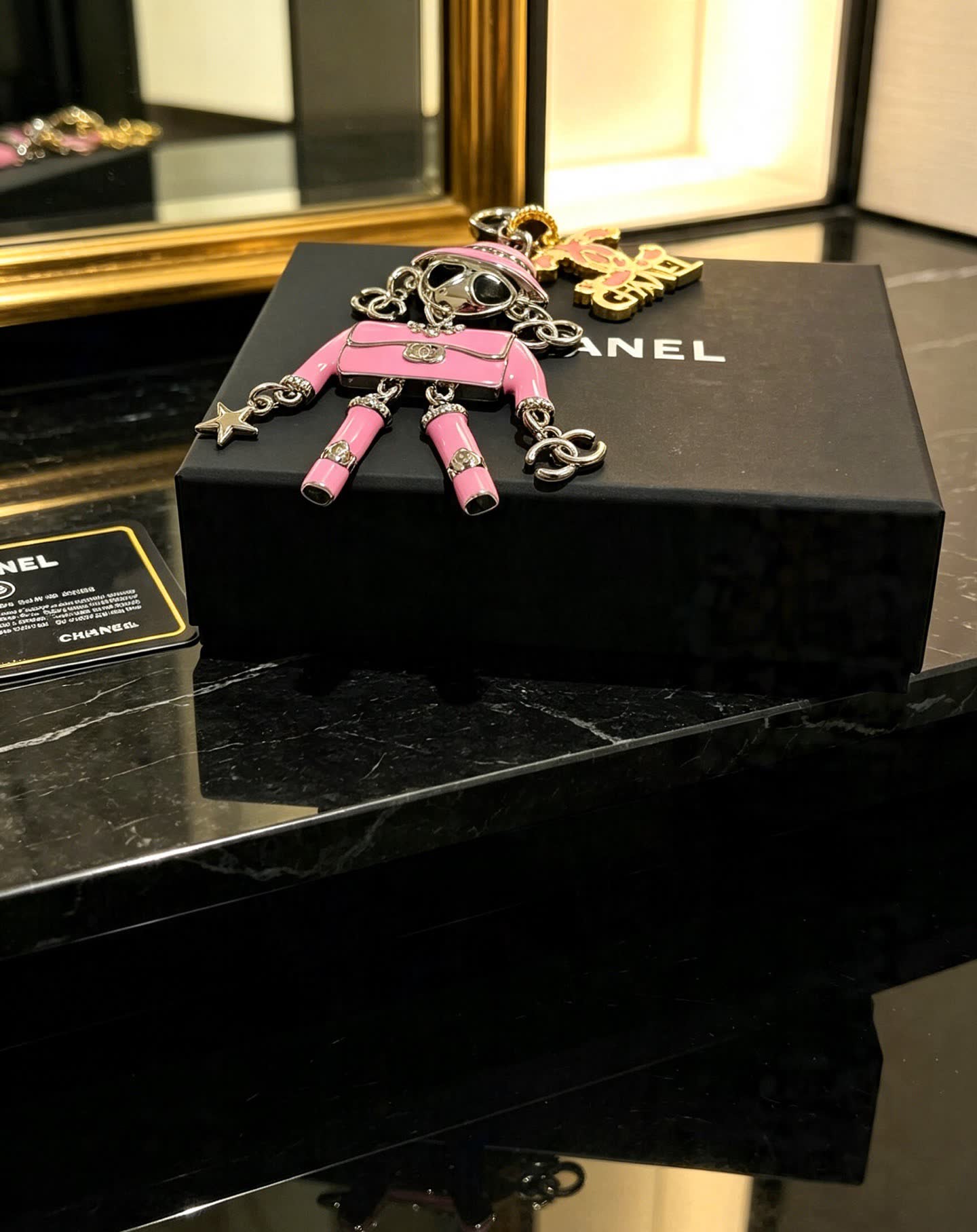 Chanel Pink Doll Charm Keychain