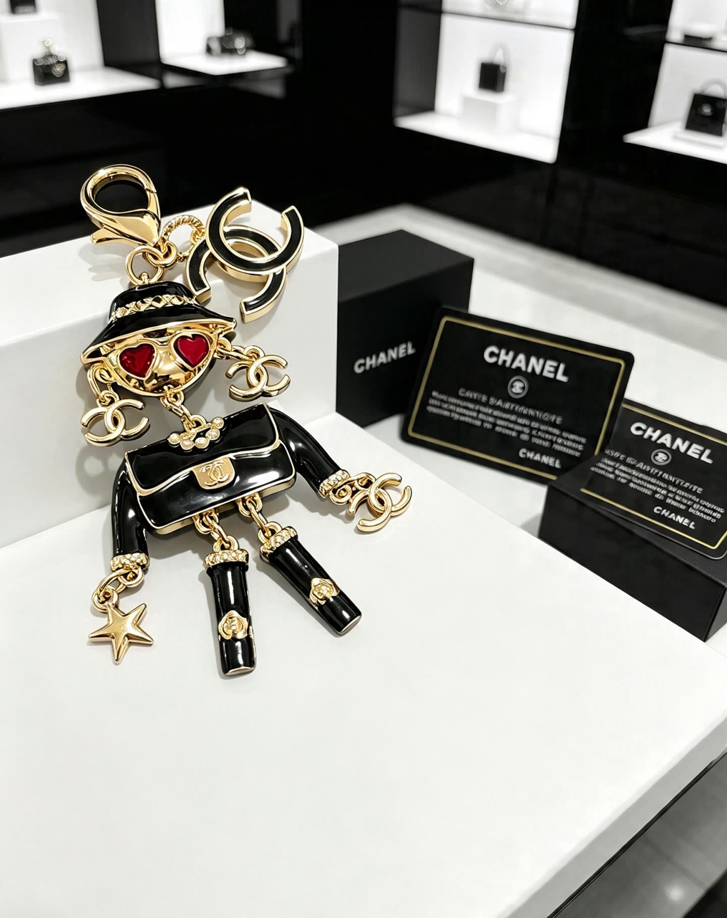 Chanel Gold-tone and Enamel Keychain