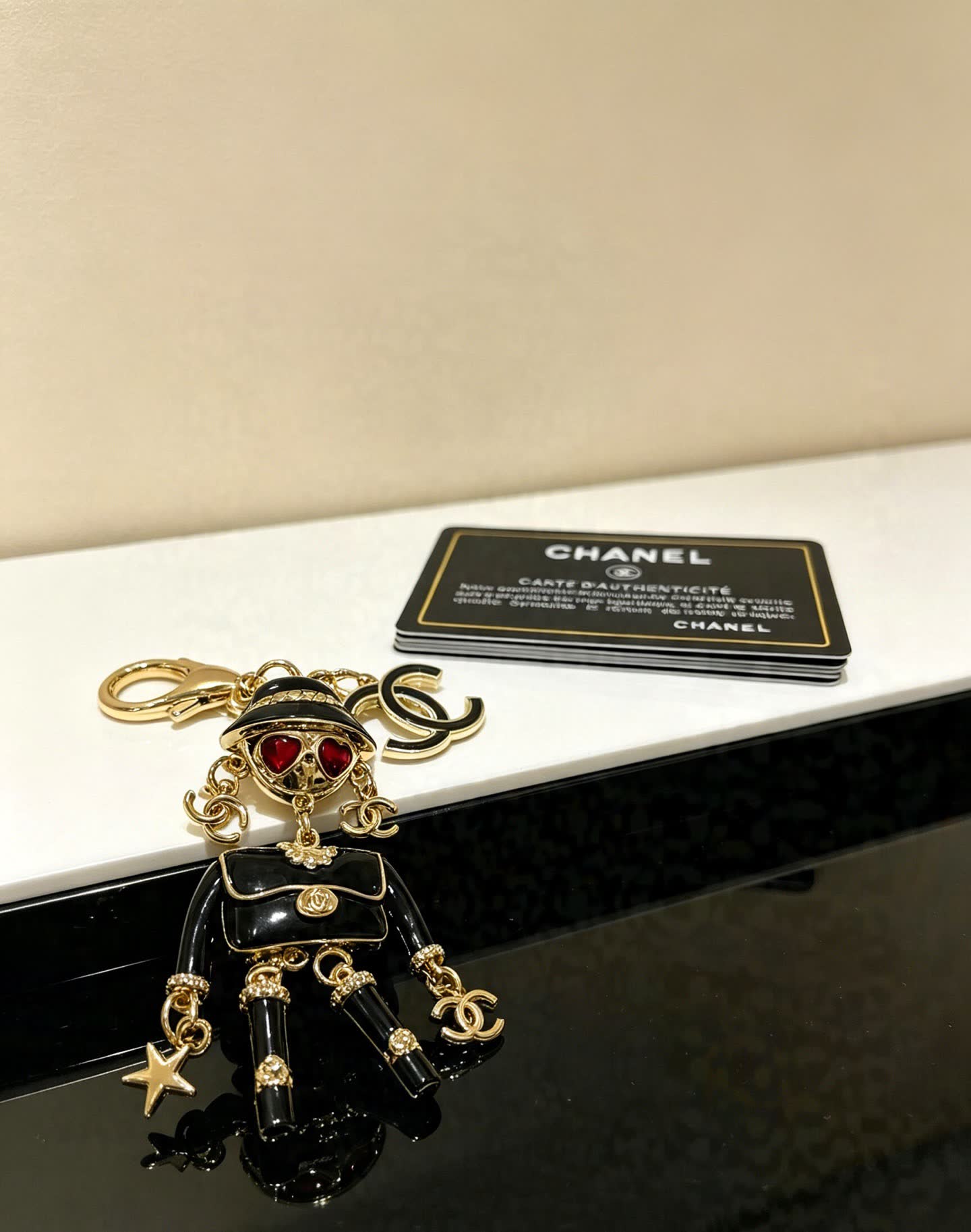 Chanel Gold-tone and Enamel Keychain