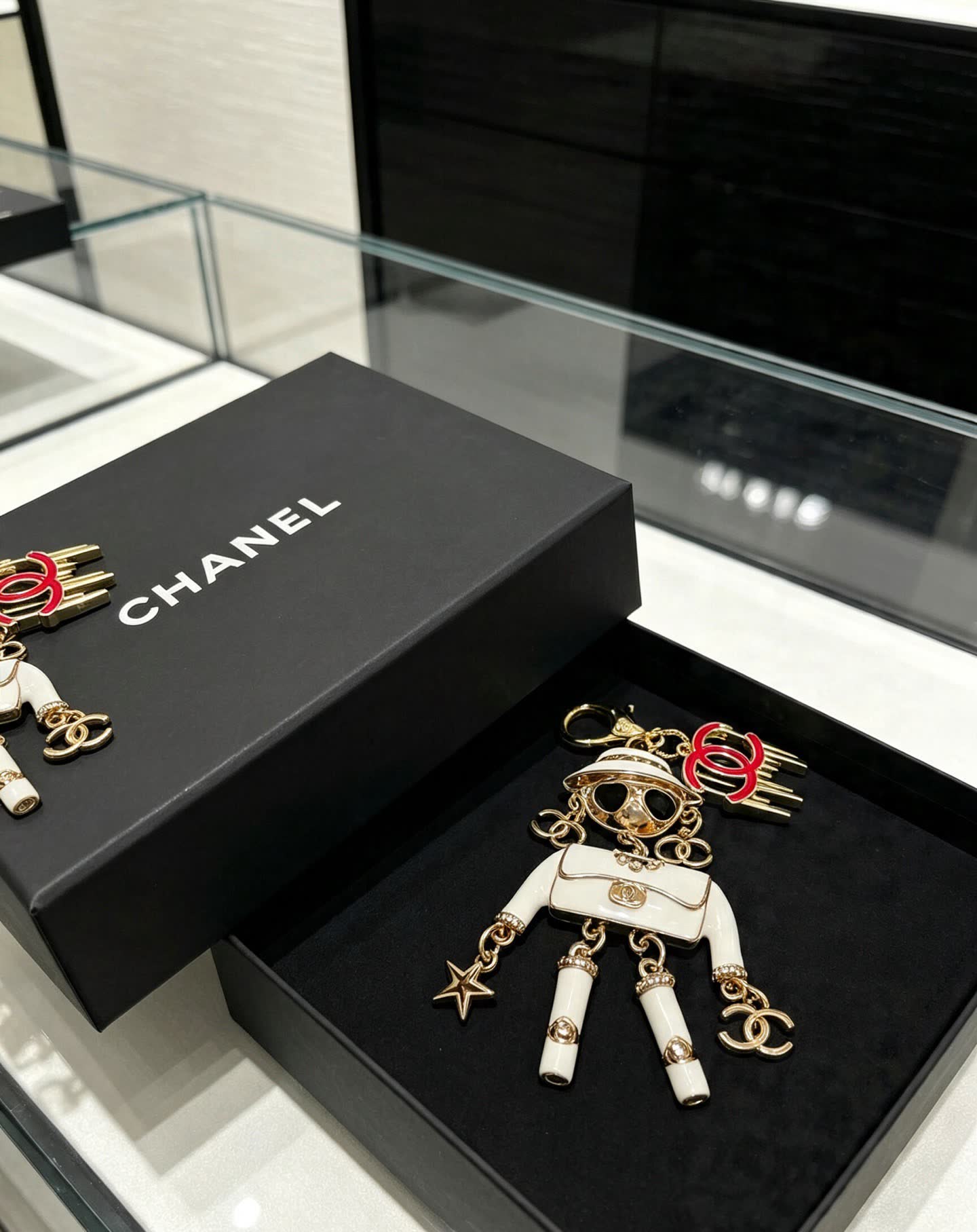 Chanel Gold and White Enamel Charm Keychain