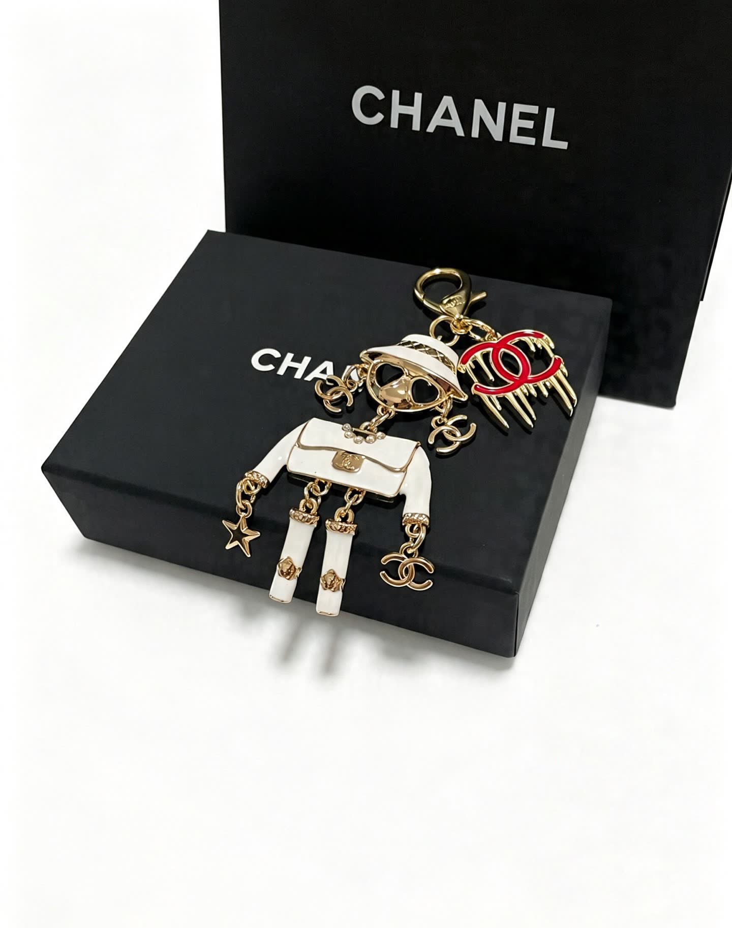 Chanel Gold and White Enamel Charm Keychain