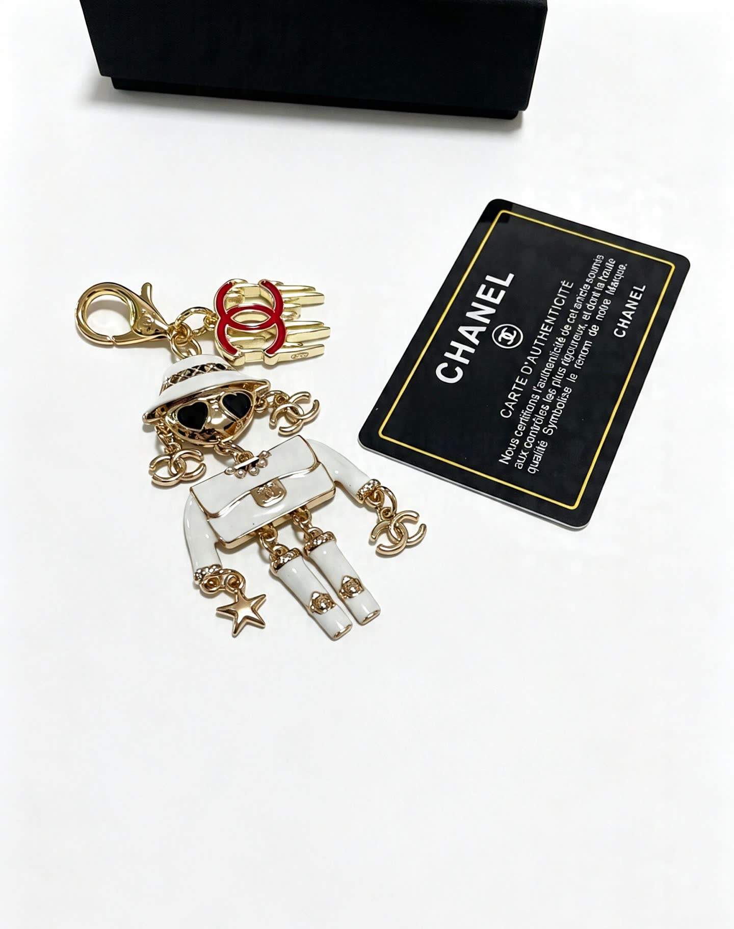Chanel Gold and White Enamel Charm Keychain
