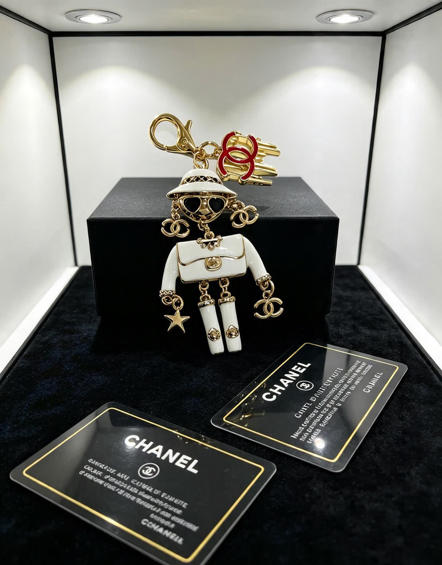 Chanel Gold and White Enamel Charm Keychain
