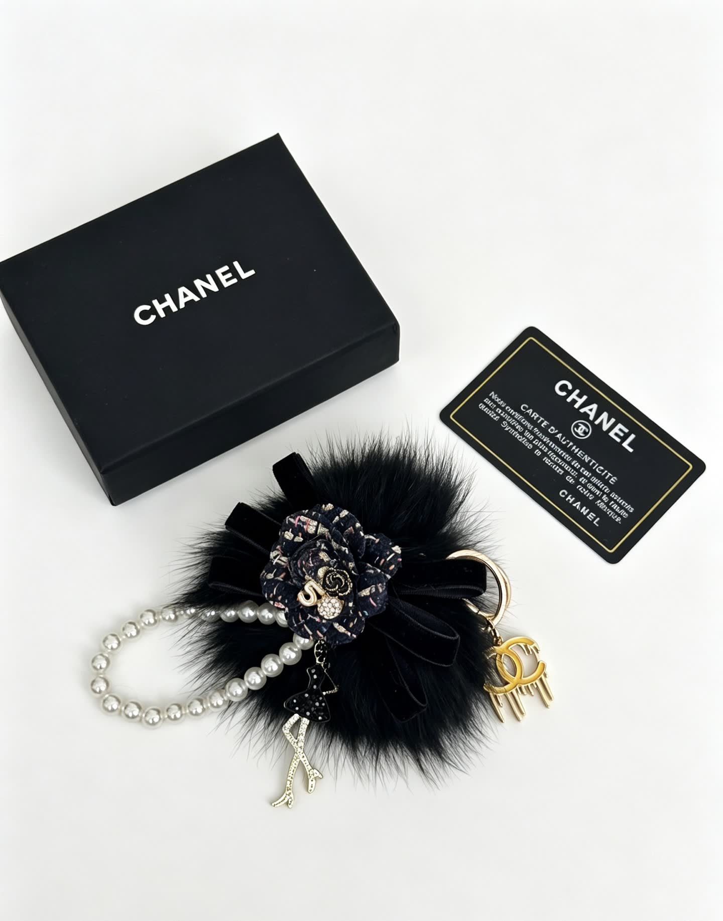 Chanel Black Furry Keychain with Pearl Bead Strap