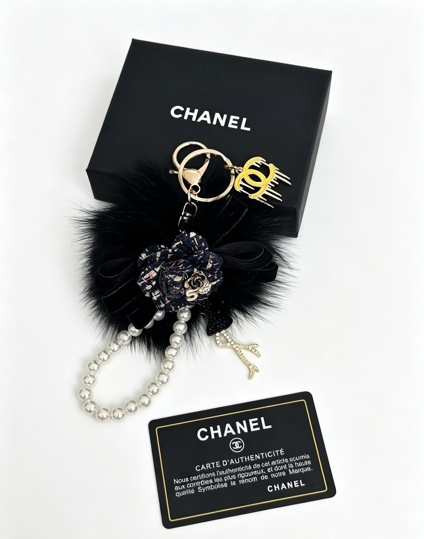 Chanel Black Furry Keychain with Pearl Bead Strap