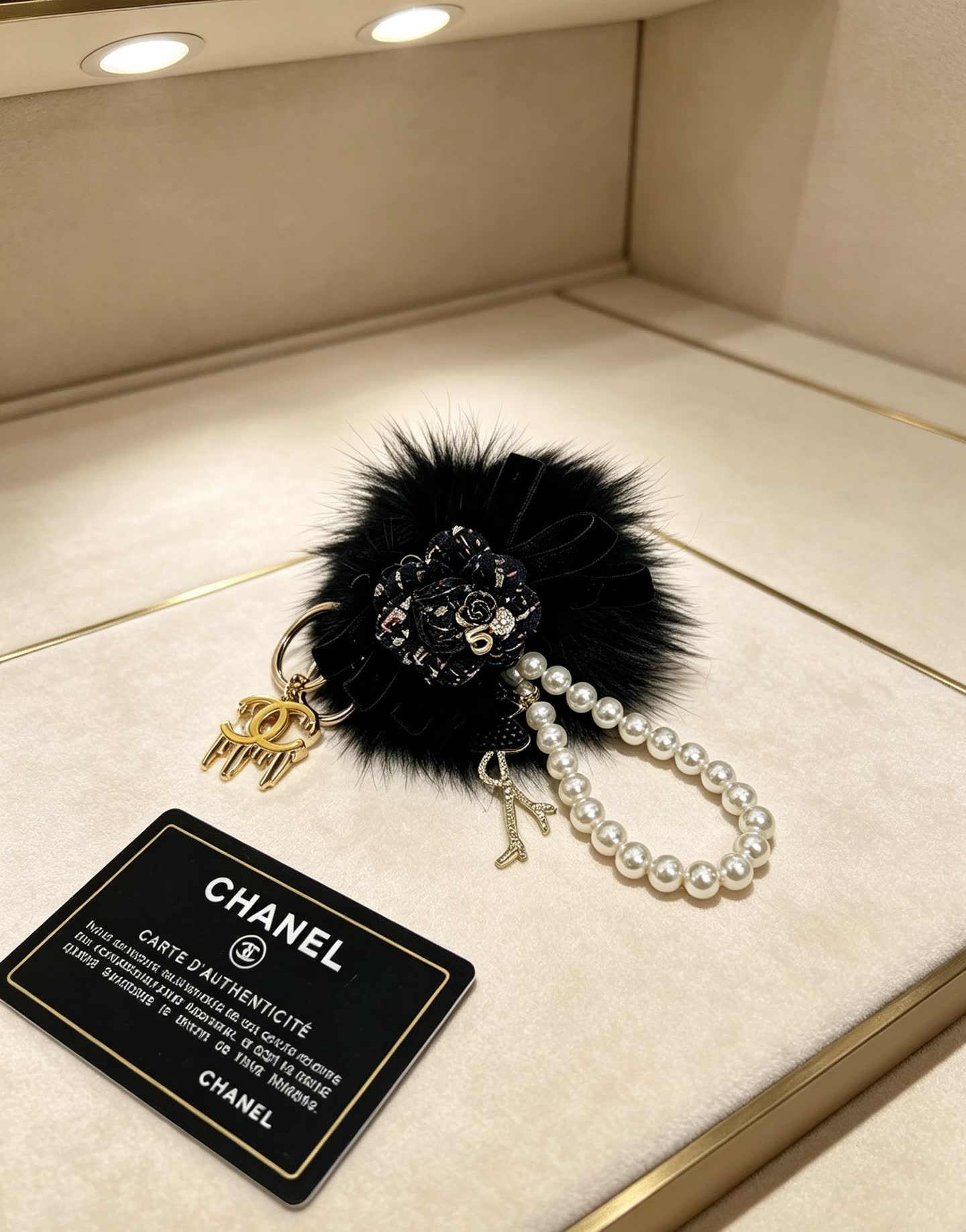 Chanel Black Furry Keychain with Pearl Bead Strap