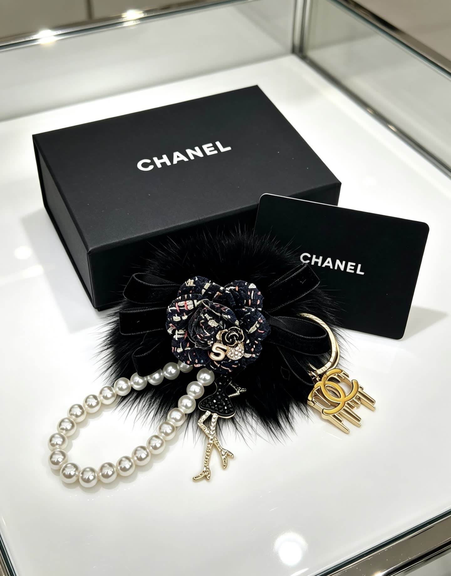 Chanel Black Furry Keychain with Pearl Bead Strap