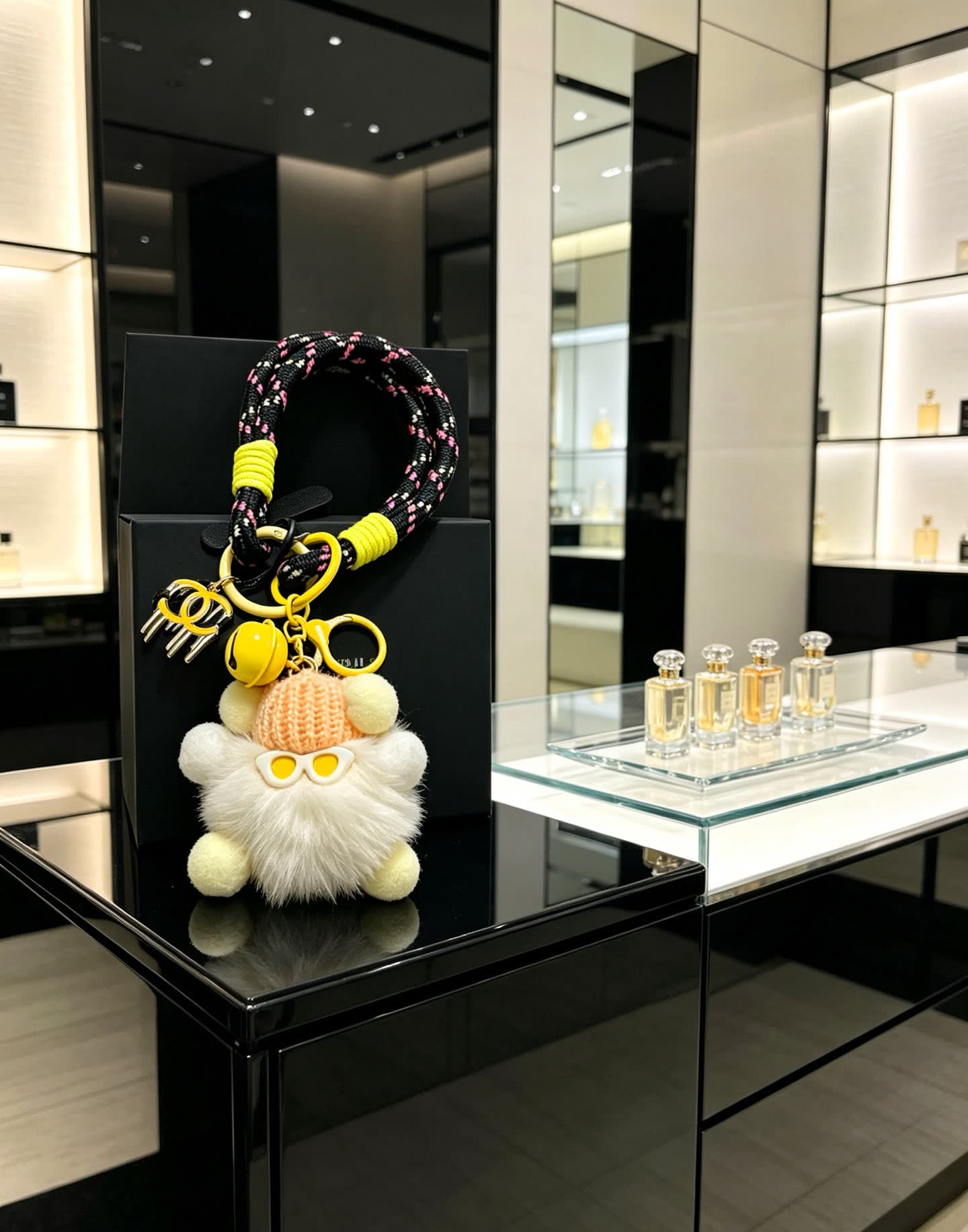 Chanel Keychain with Pom-Pom and Chain Strap